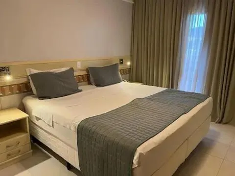 Bedroom, Bed in Studio à beira mar - Hotel Jurerê Beach Village