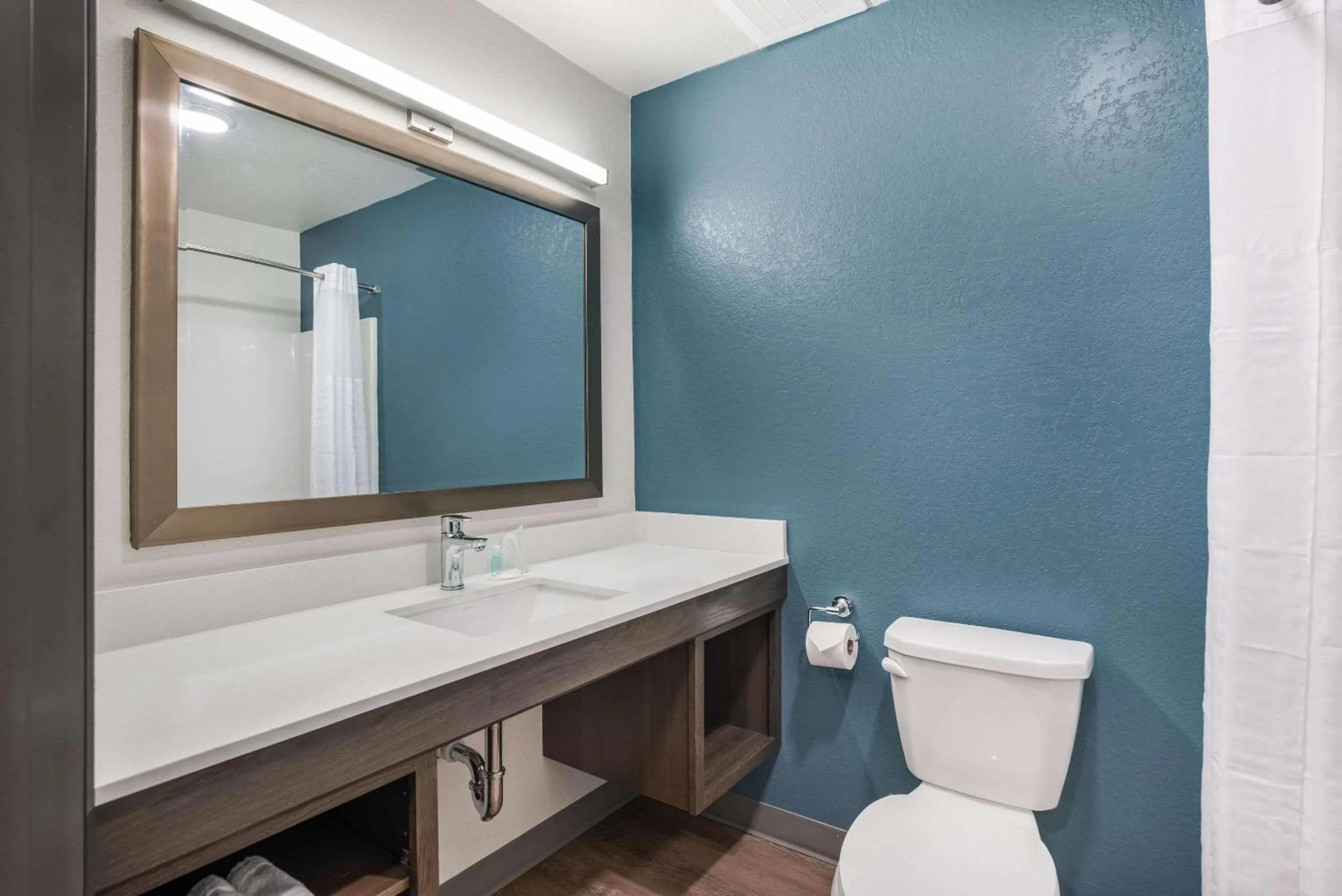 Bathroom in WoodSpring Suites Sulphur - Lake Charles