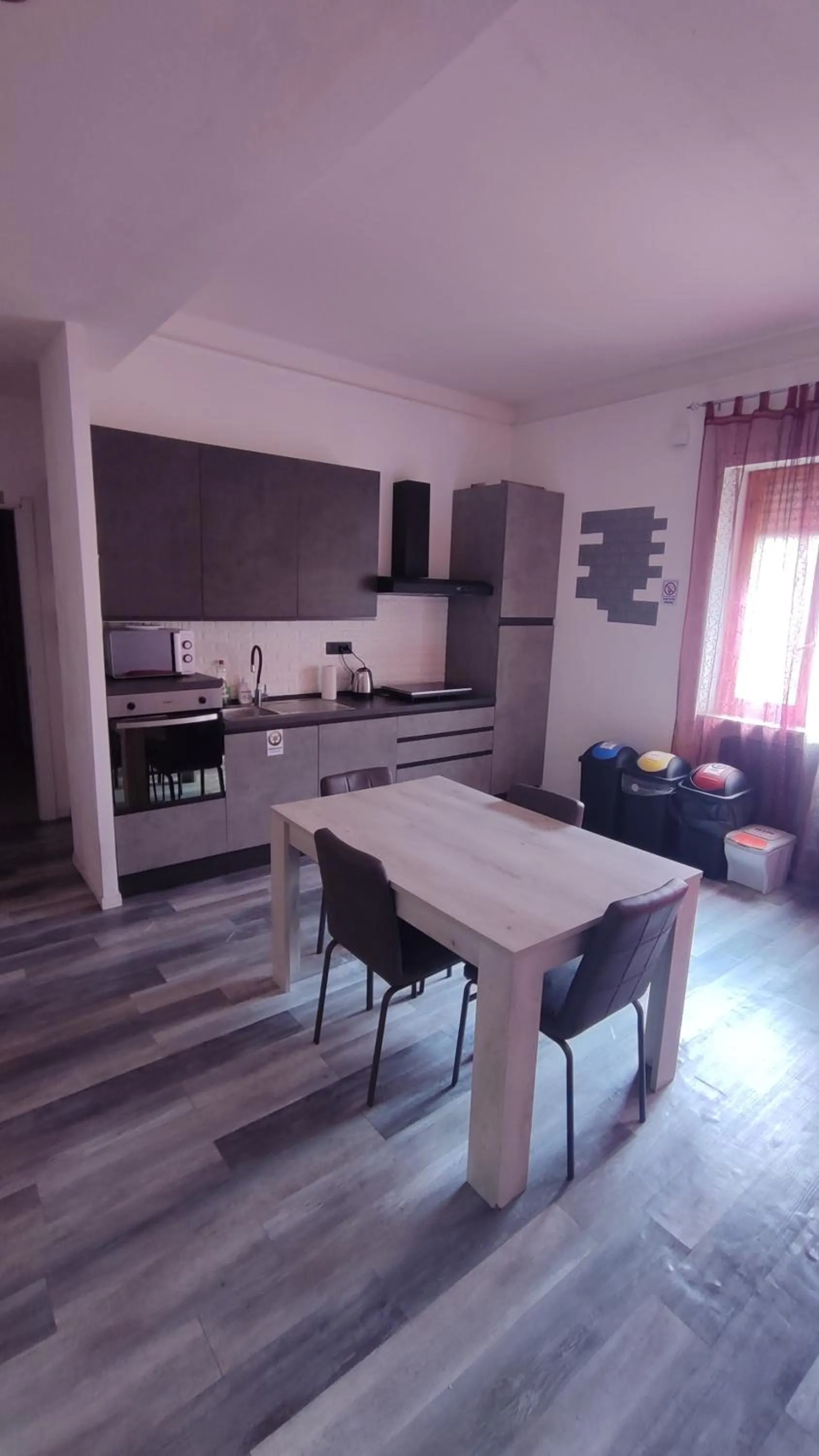 Kitchen or kitchenette in B&B Sa Casadina