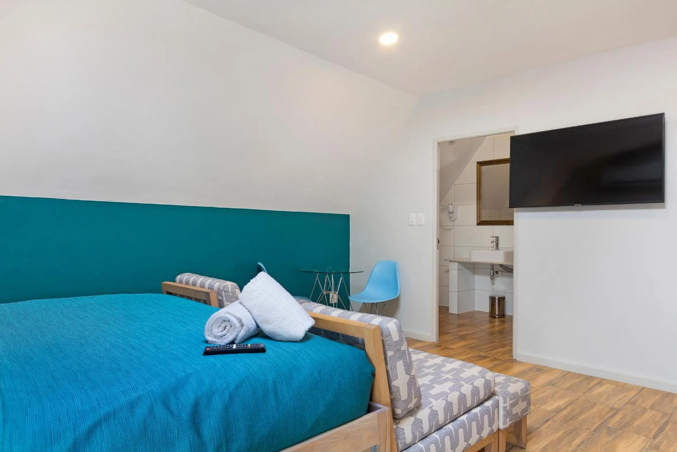 Bed in Urban Oasis Aparthotel