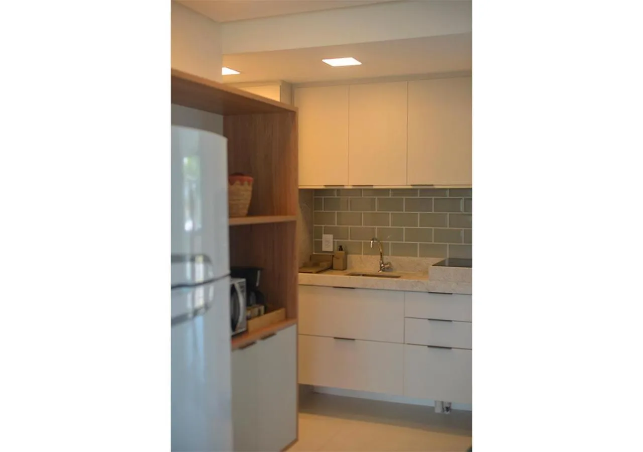 Kitchen or kitchenette in Flat Beach Class Muro Alto 1107