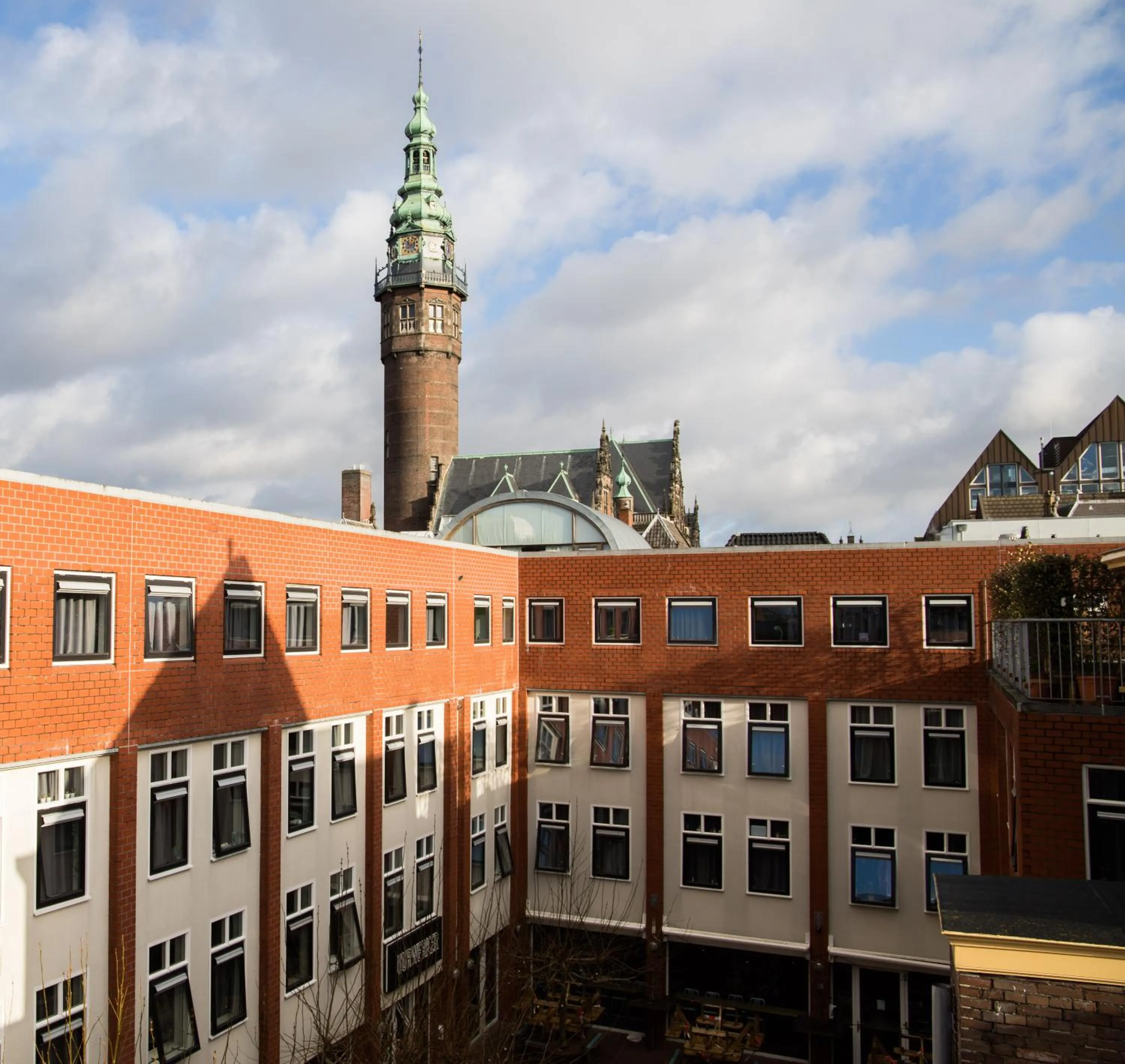 Property building in Hotel The Happy Traveler