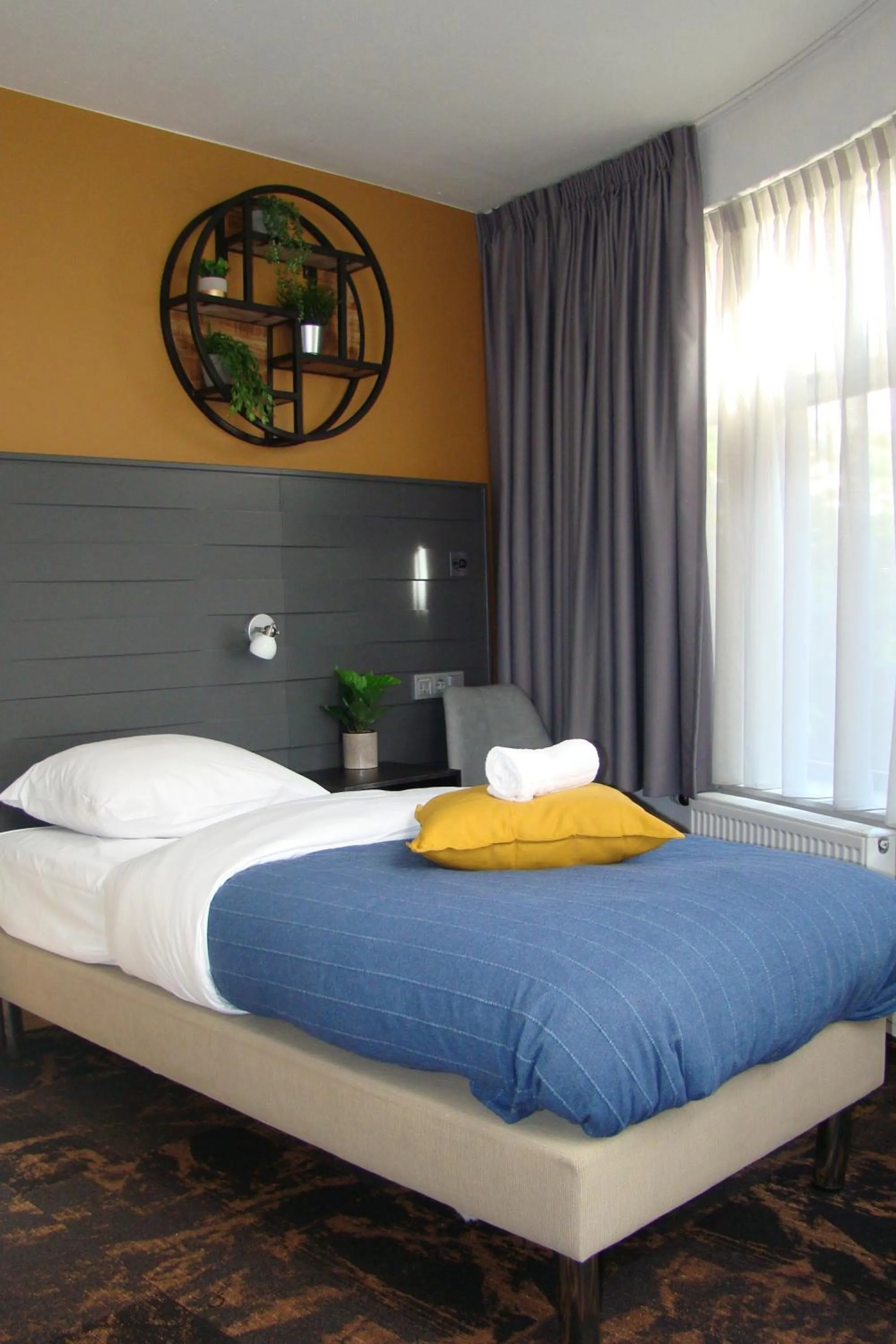 Bed in Hotel The Happy Traveler