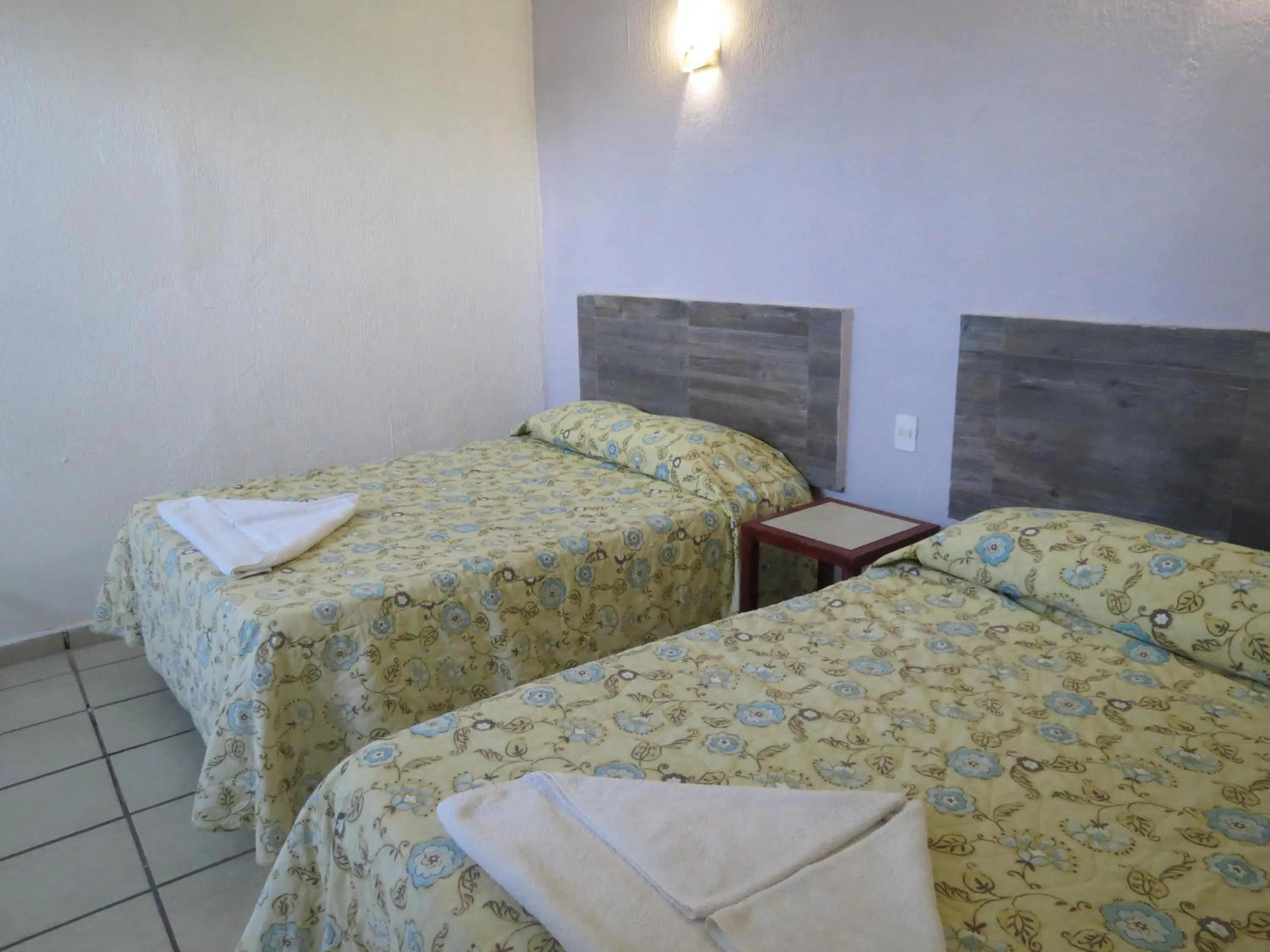 Bed in Hotel Albri by Rotamundos