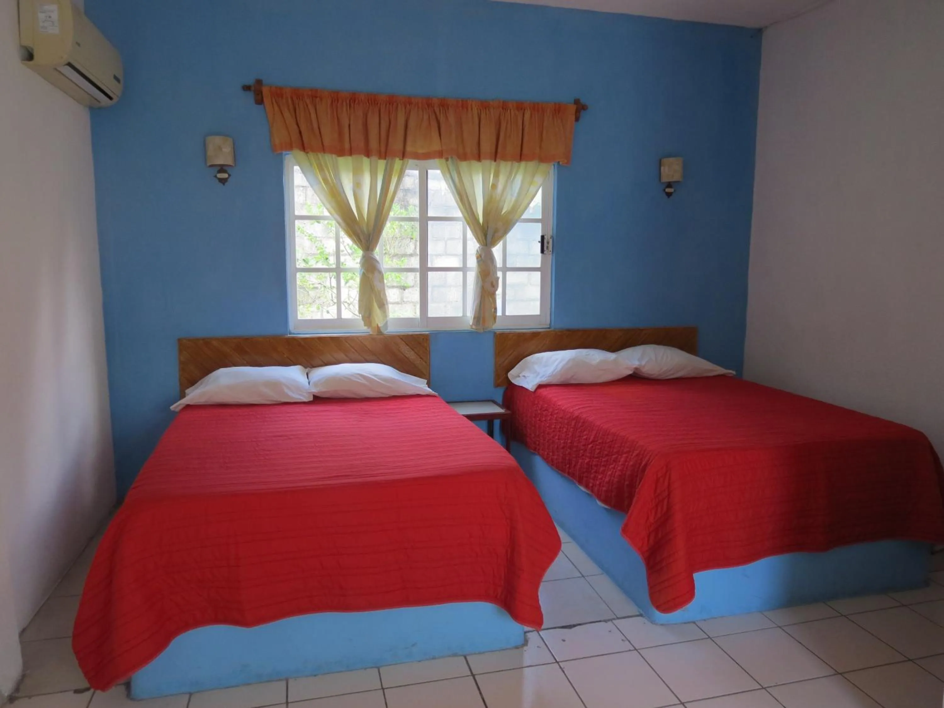 Bed in Hotel Albri by Rotamundos