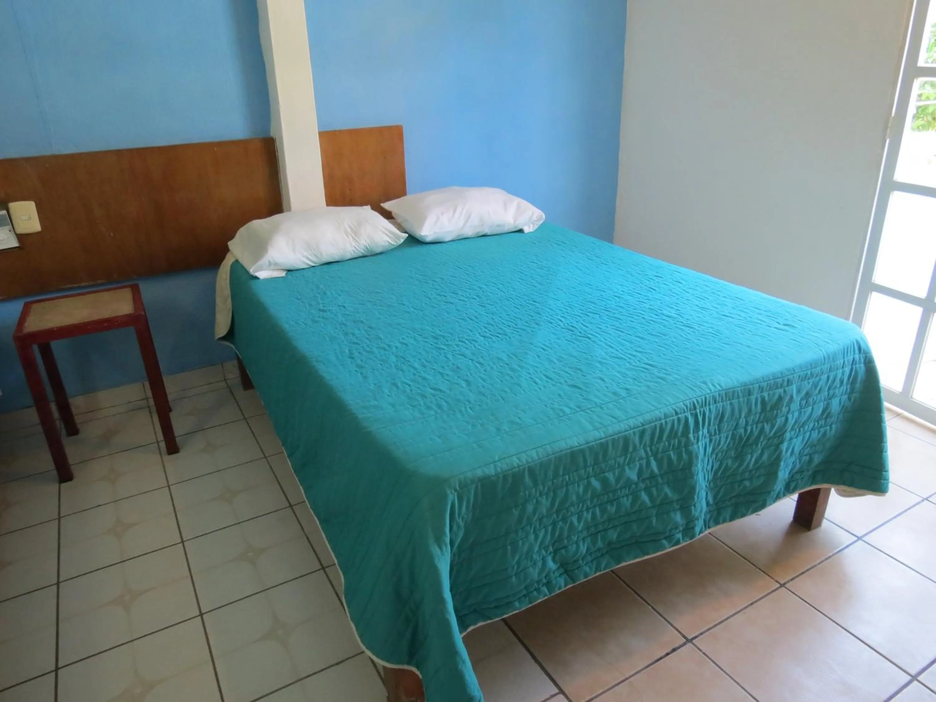 Bed in Hotel Albri by Rotamundos