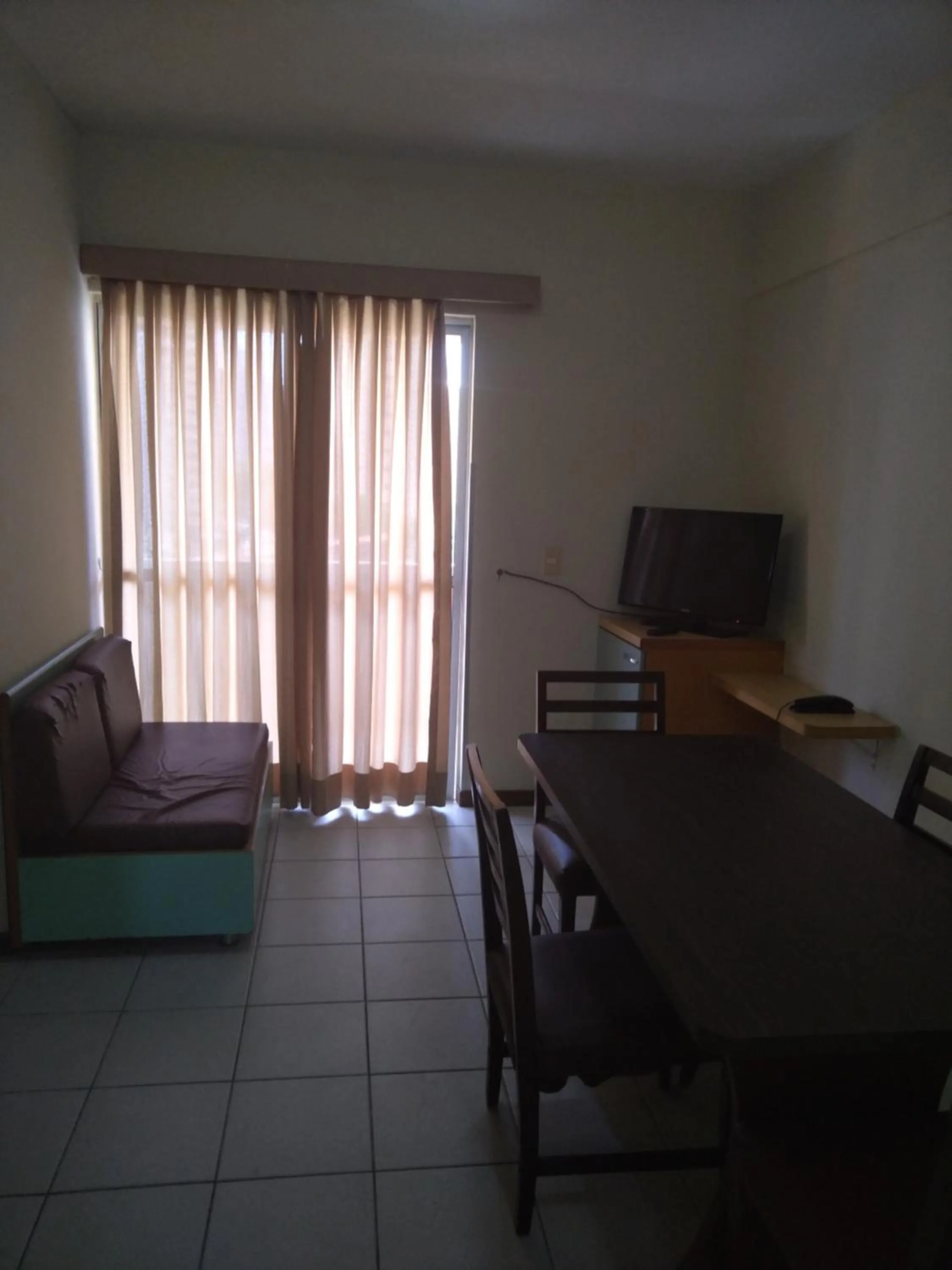 Seating area in Condomínio Flat La Perla