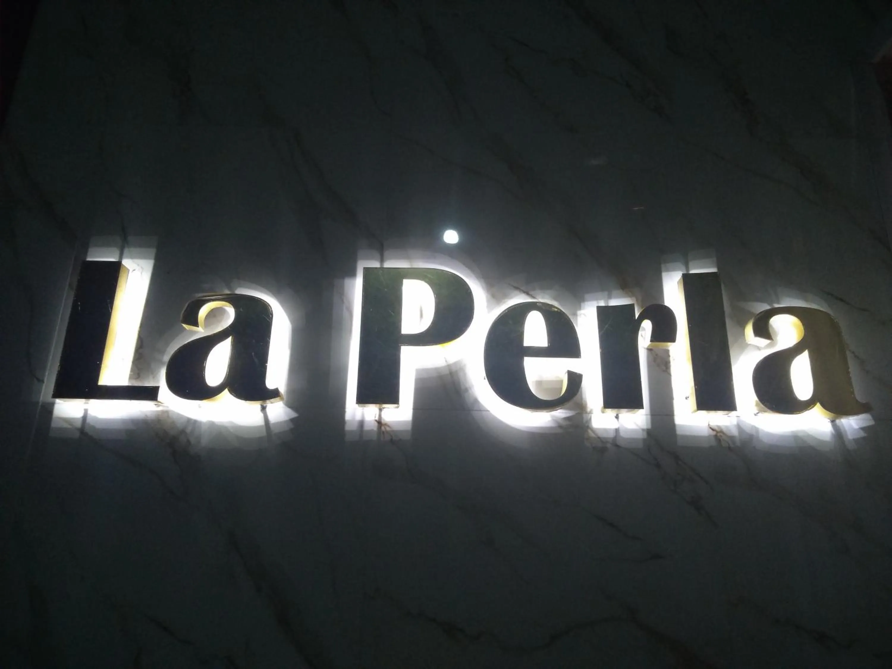 Property logo or sign in Condomínio Flat La Perla