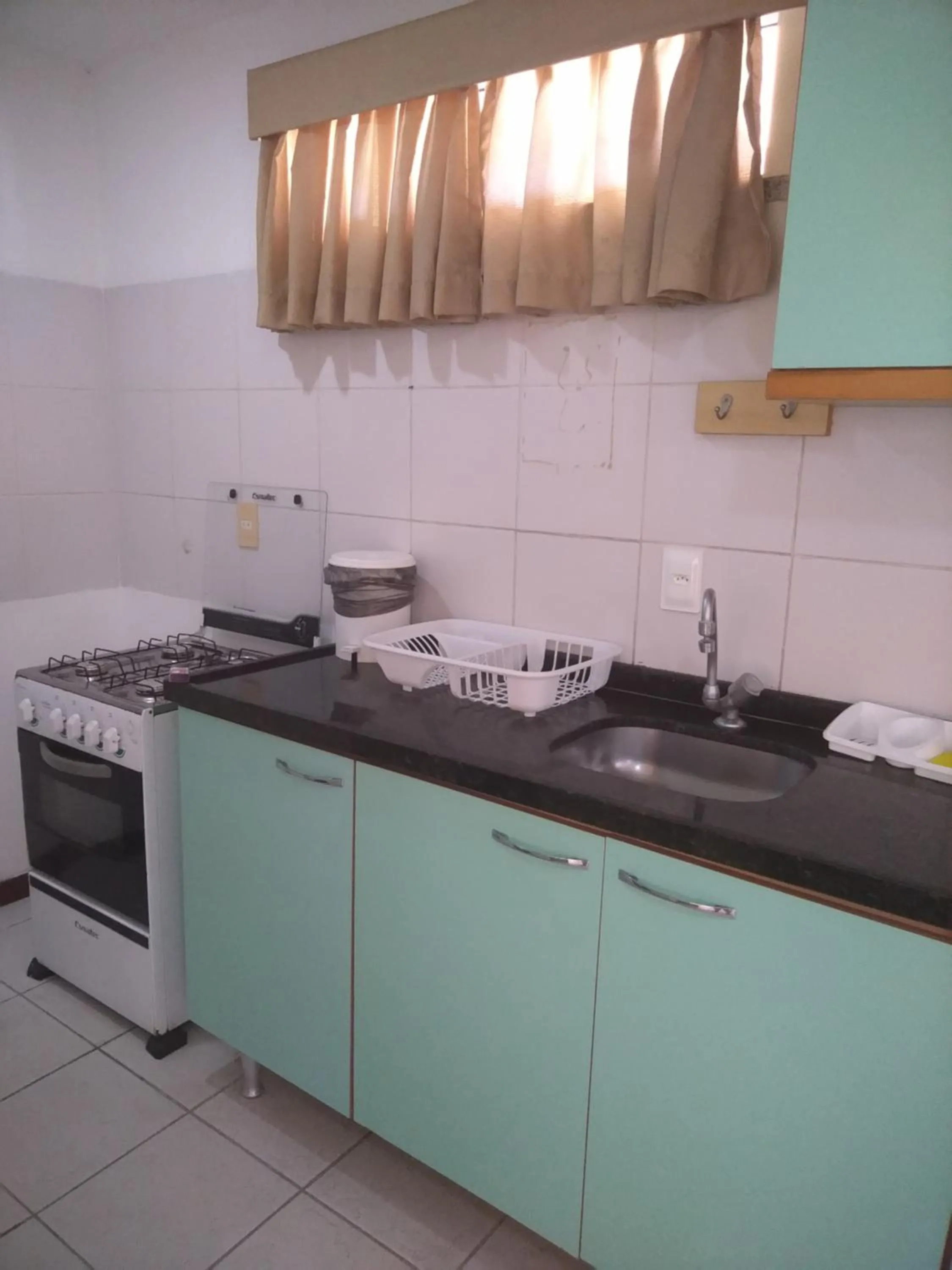 Kitchen or kitchenette in Condomínio Flat La Perla