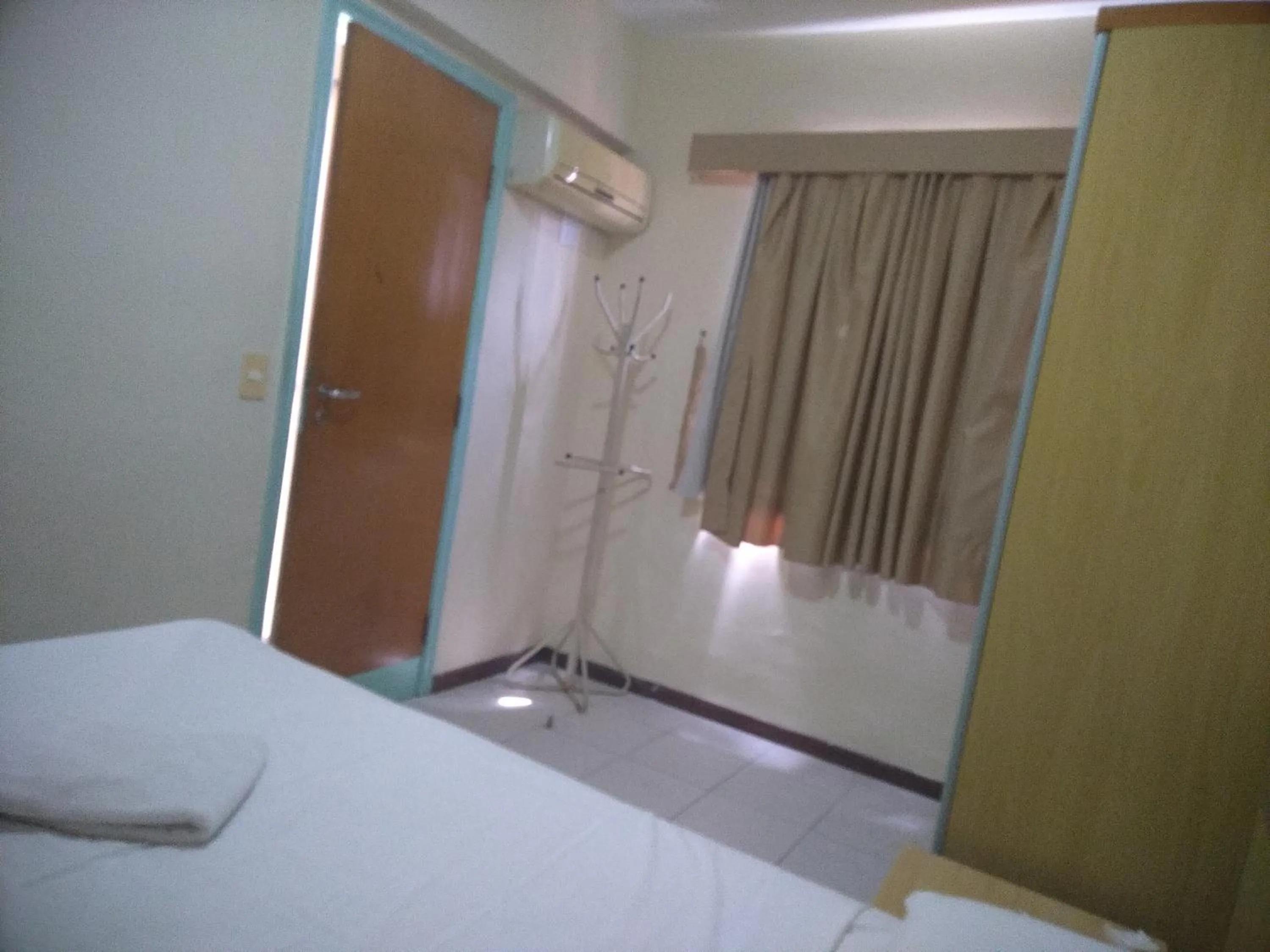 Bedroom, Bed in Condomínio Flat La Perla