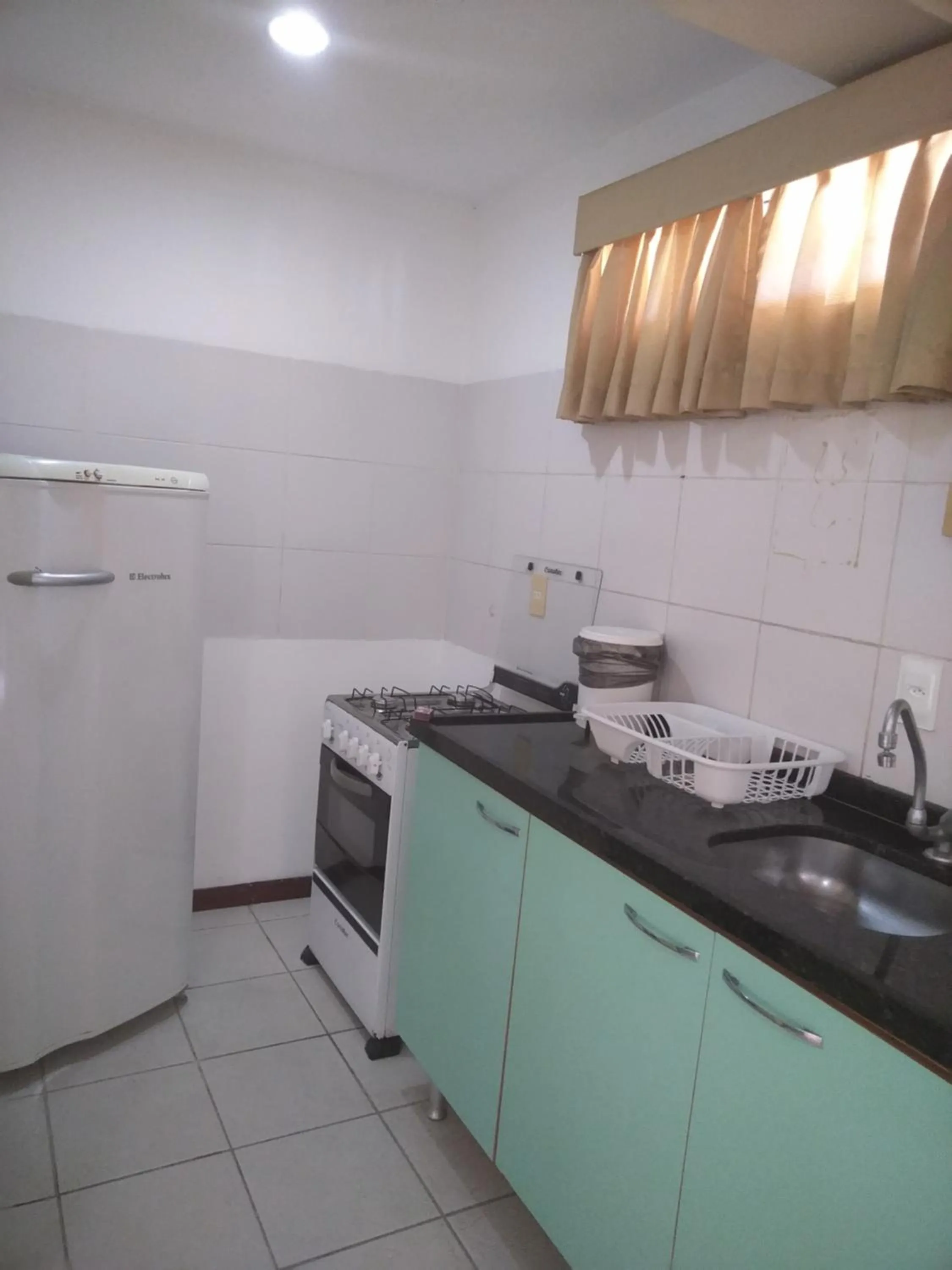 Kitchen or kitchenette in Condomínio Flat La Perla