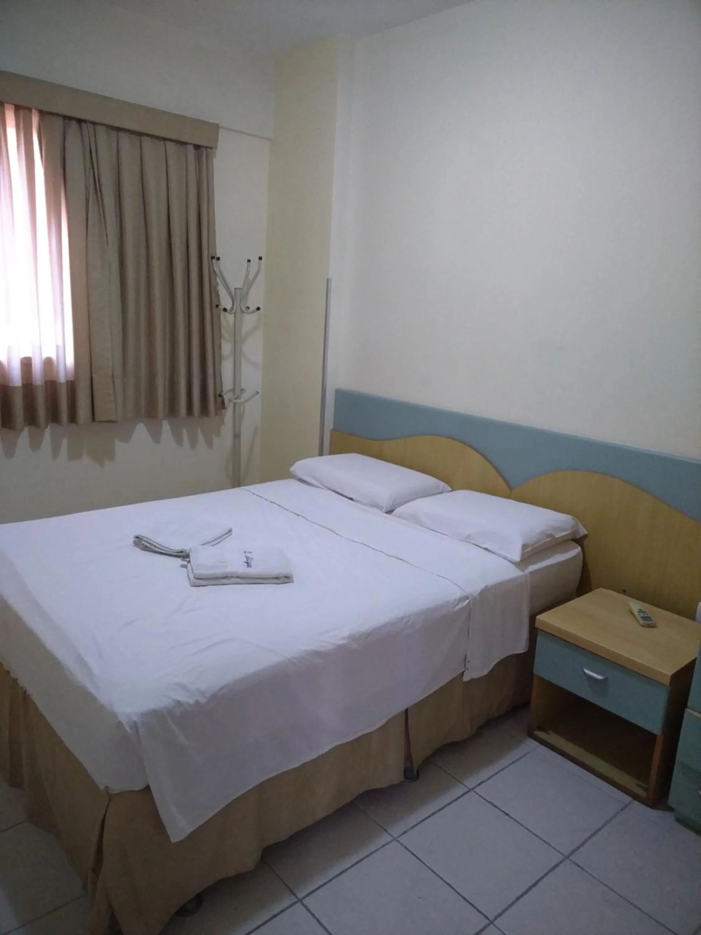 Bed in Condomínio Flat La Perla
