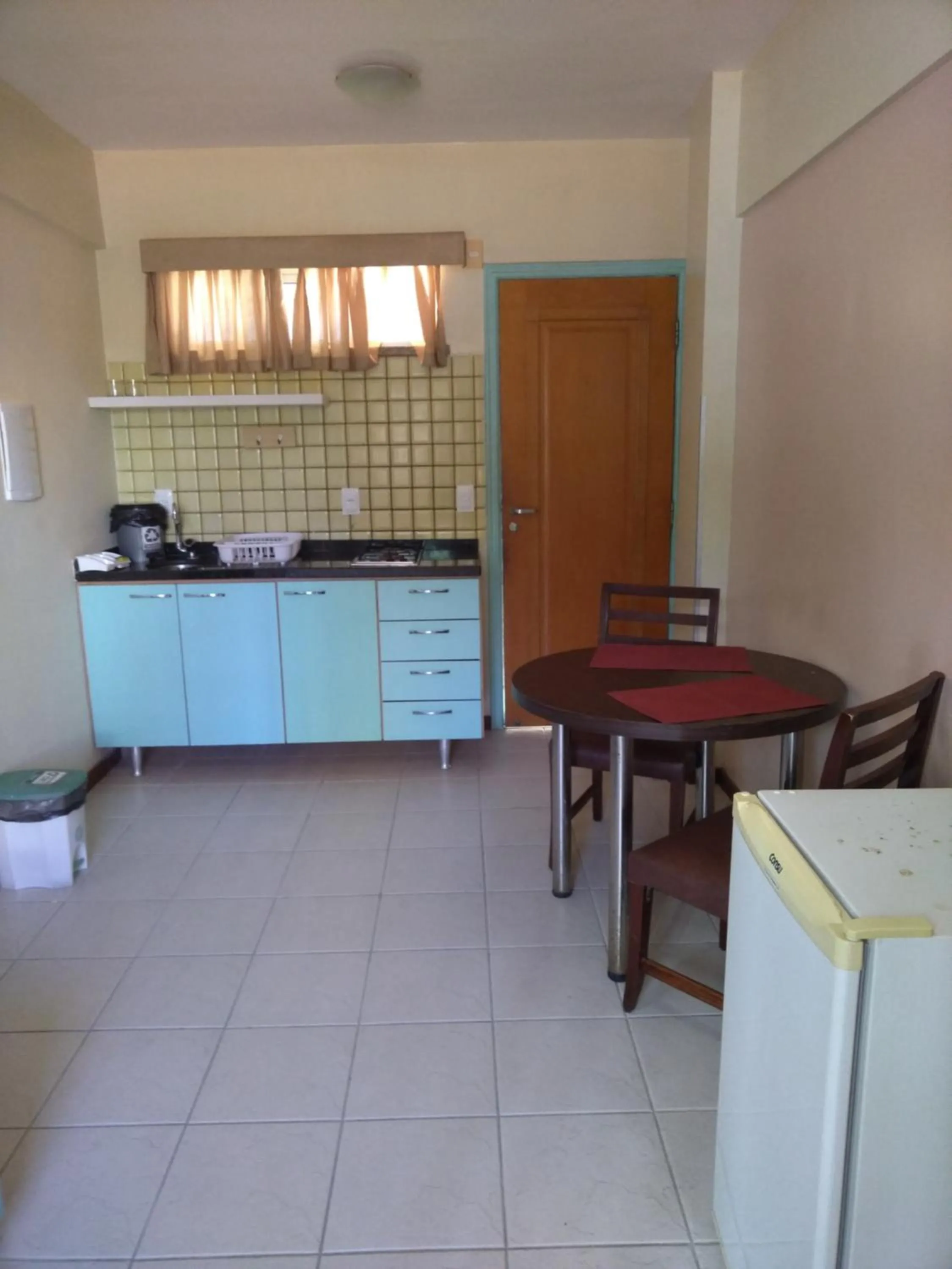 Kitchen or kitchenette in Condomínio Flat La Perla