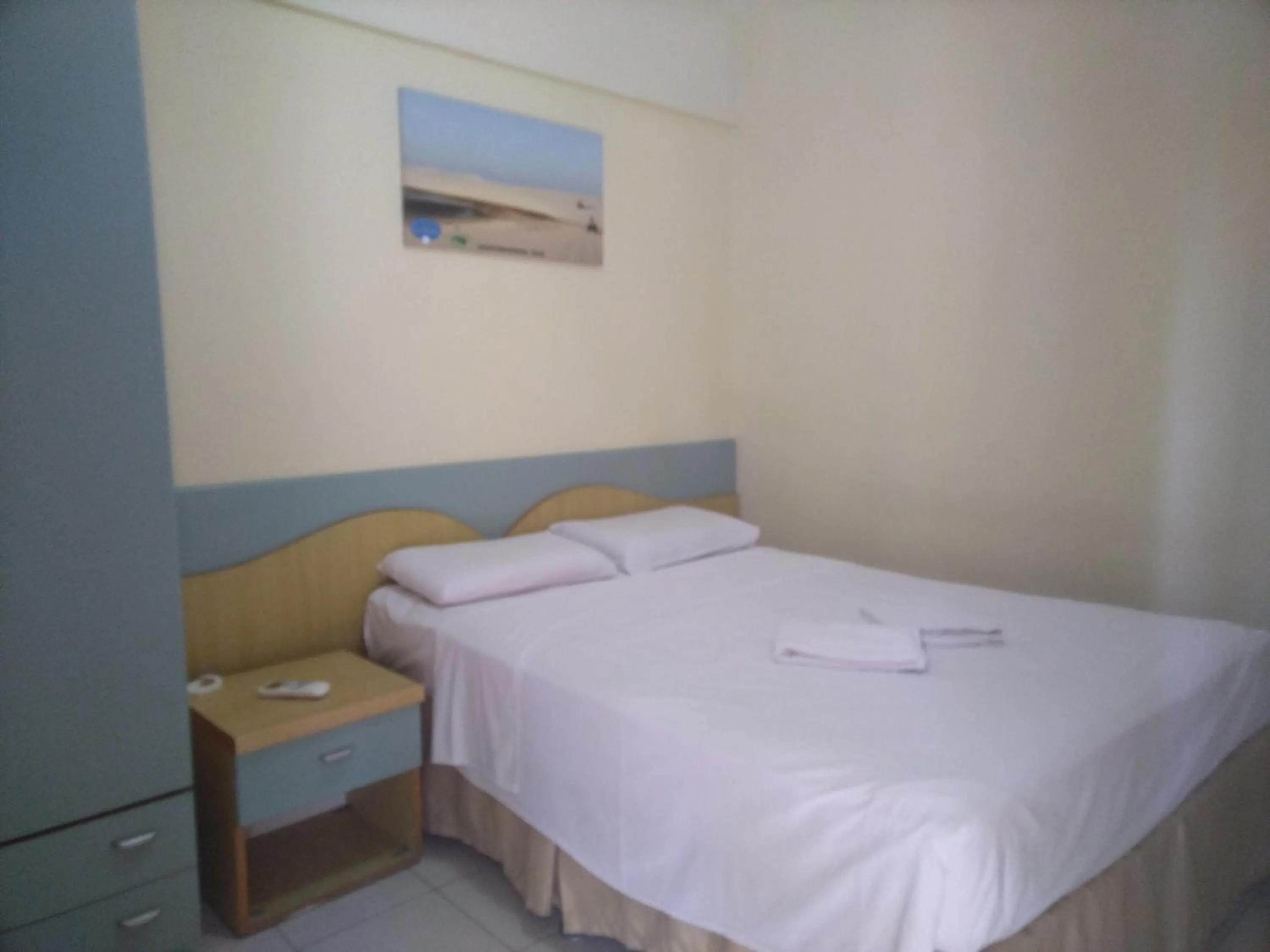 Bedroom, Bed in Condomínio Flat La Perla