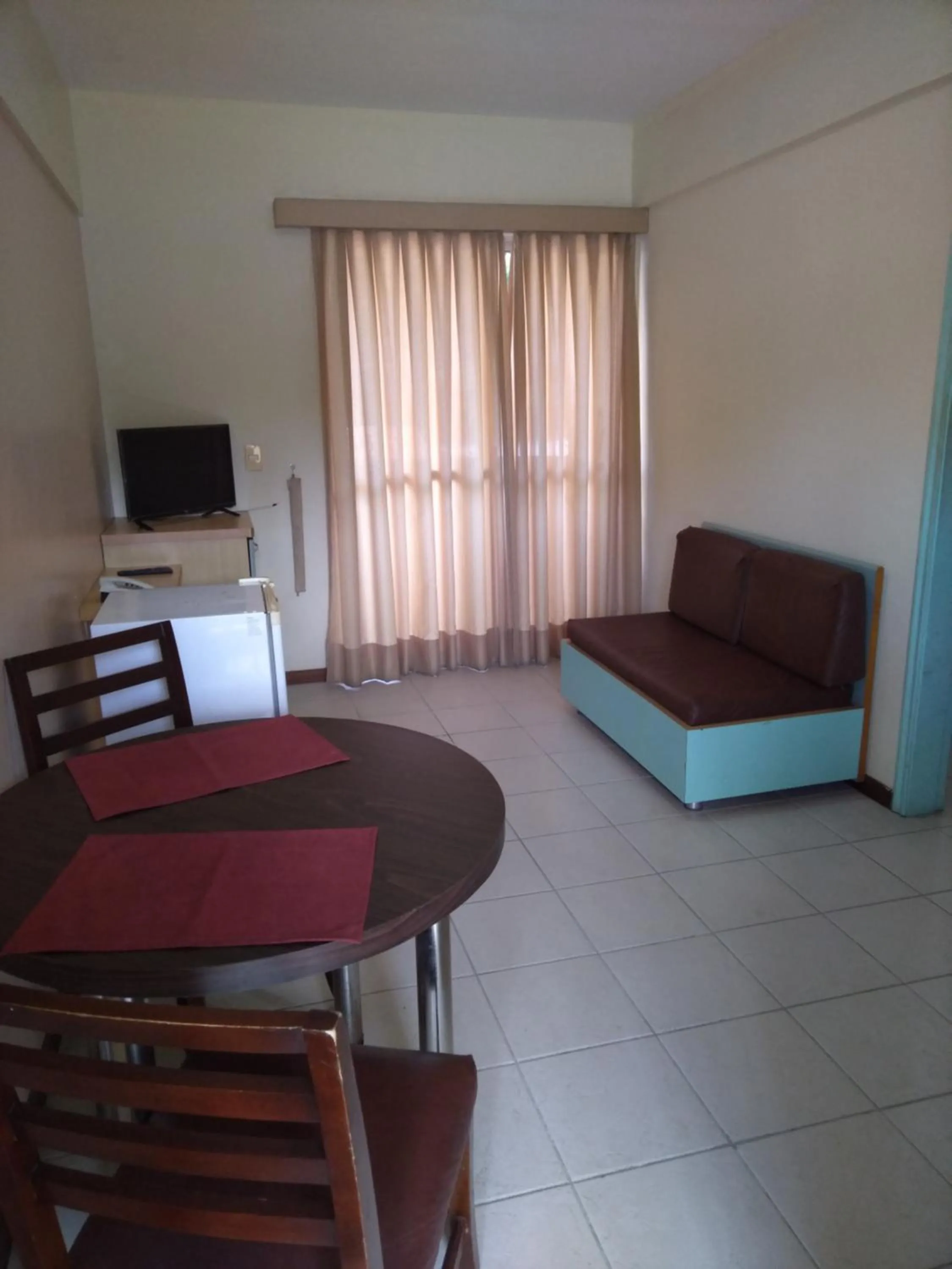 Living room in Condomínio Flat La Perla