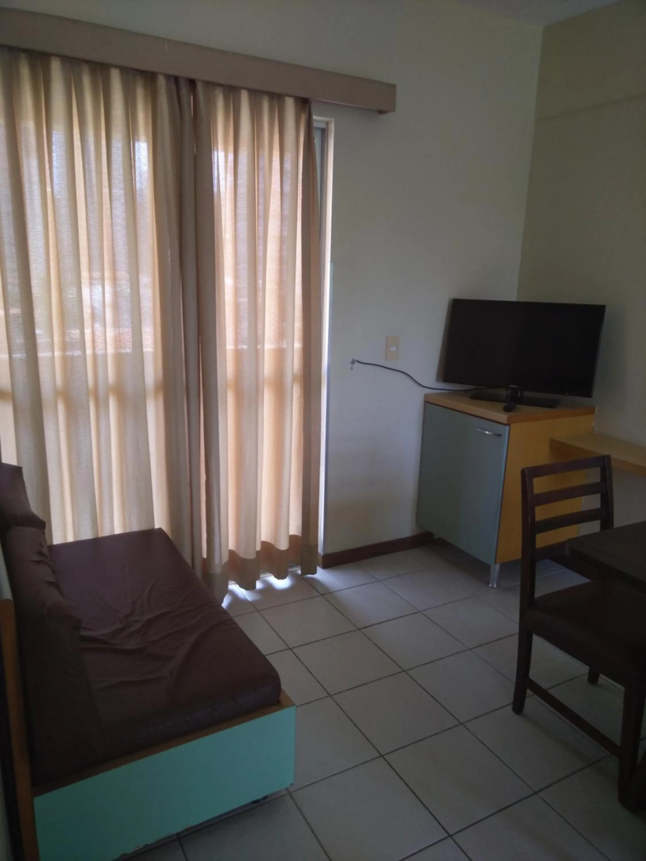 Communal lounge/ TV room, Bed in Condomínio Flat La Perla