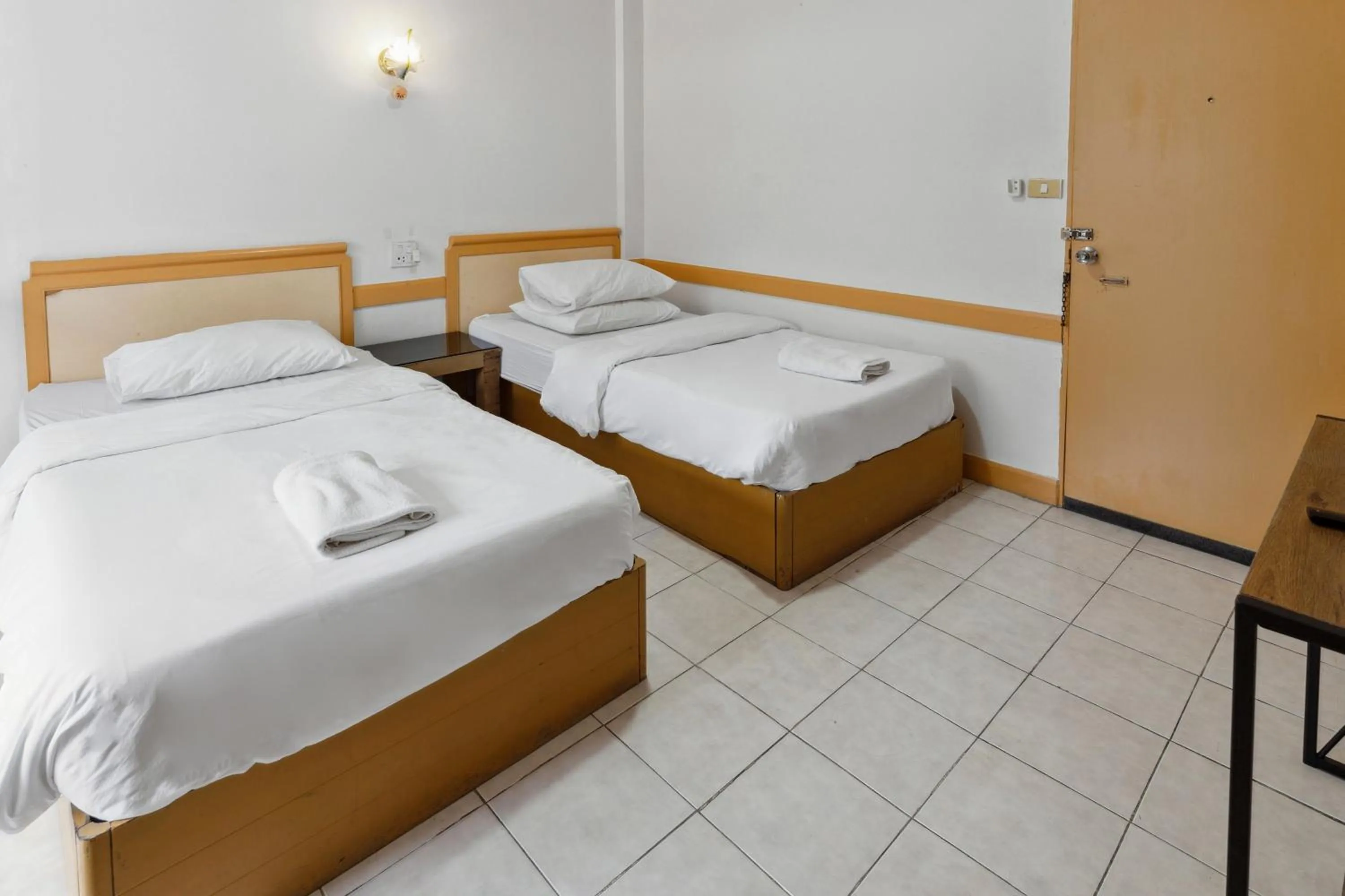 Bed in Phu Inn Hotel