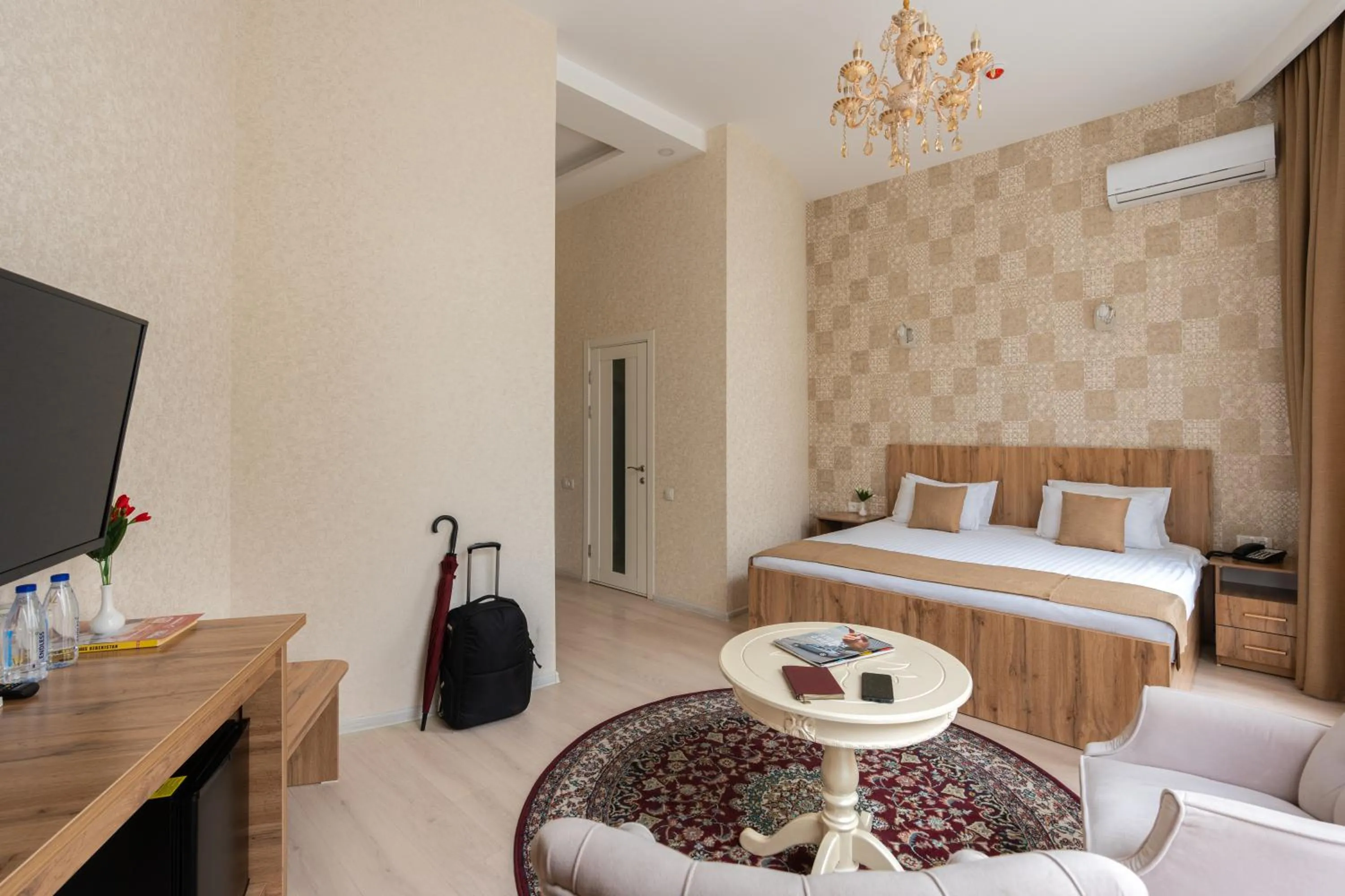 Photo of the whole room, Bed in Shoxjahon Hotel - 600 Mbps Internet