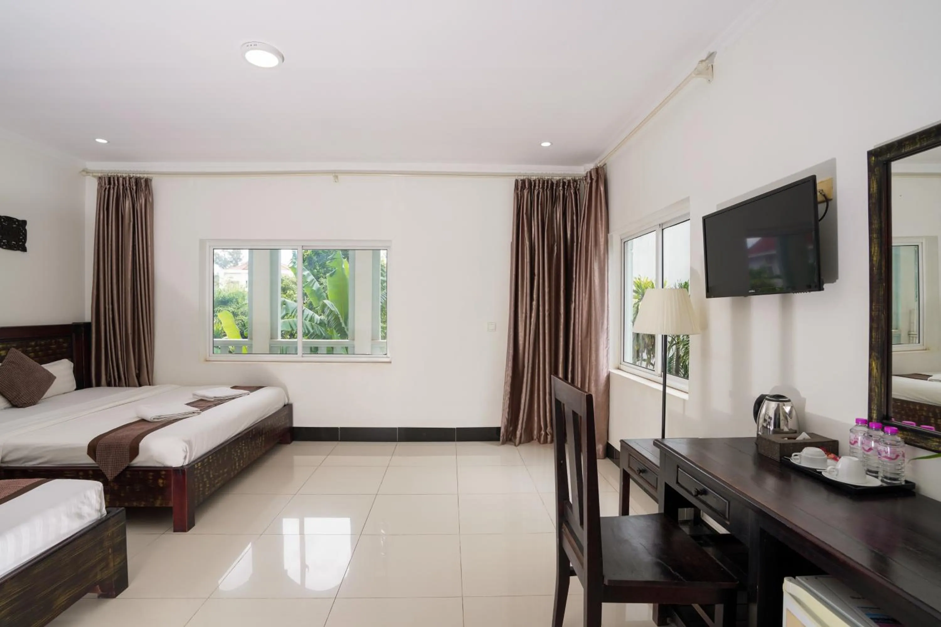 Communal lounge/ TV room in Tan Sokchea Boutique