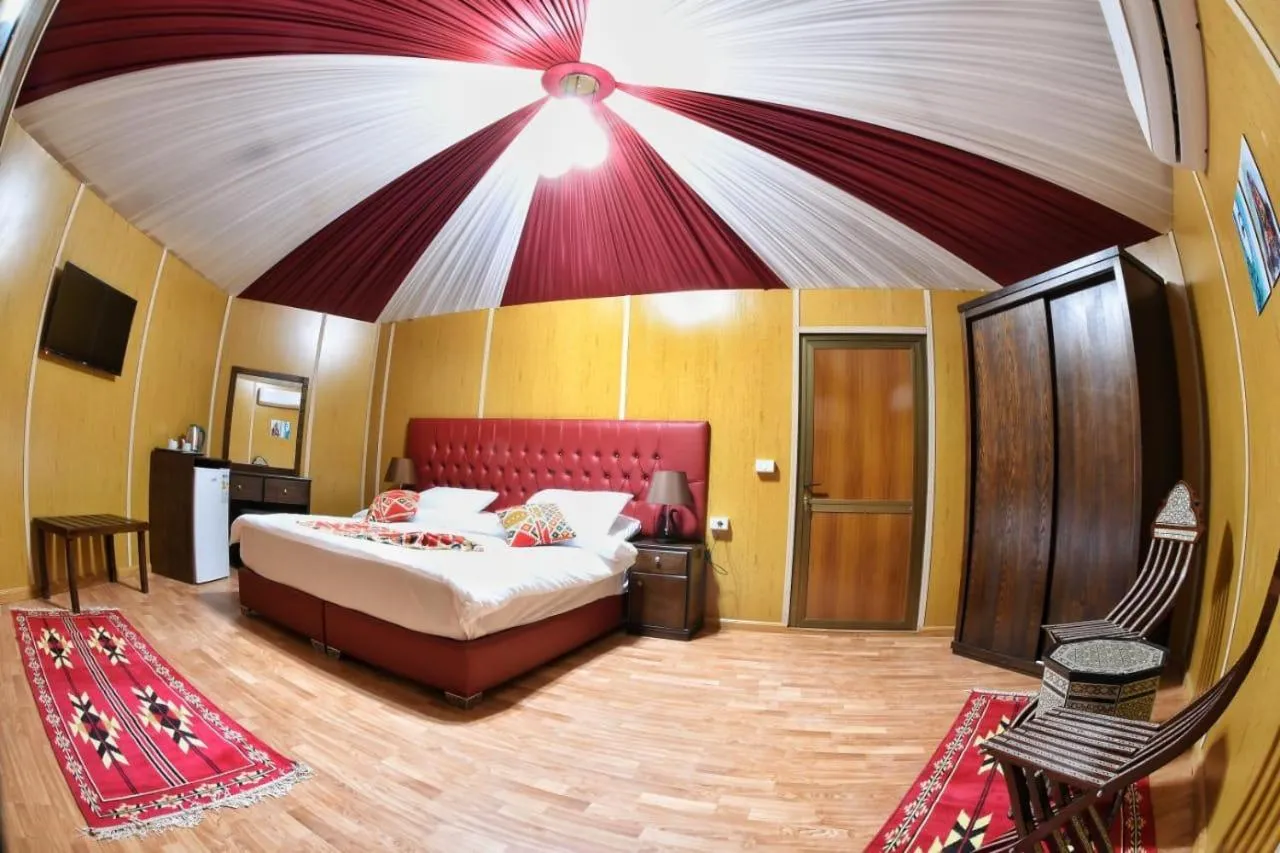 Bed in Rum Oasis Luxury Camp
