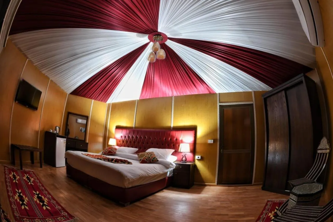 Bed in Rum Oasis Luxury Camp