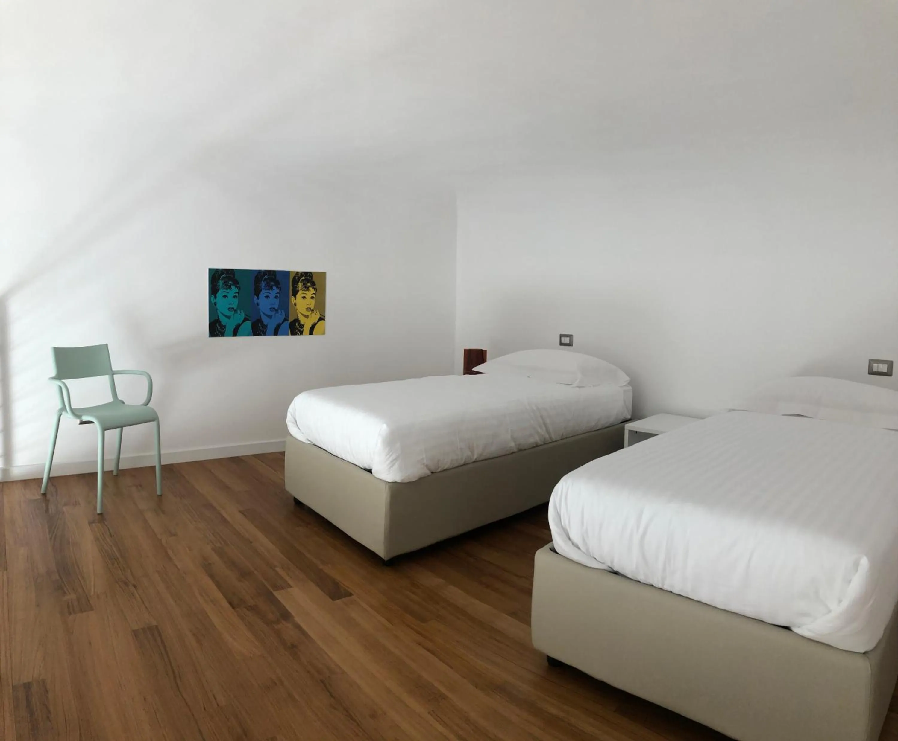 Bed in Lo Schiaccianoci B&B