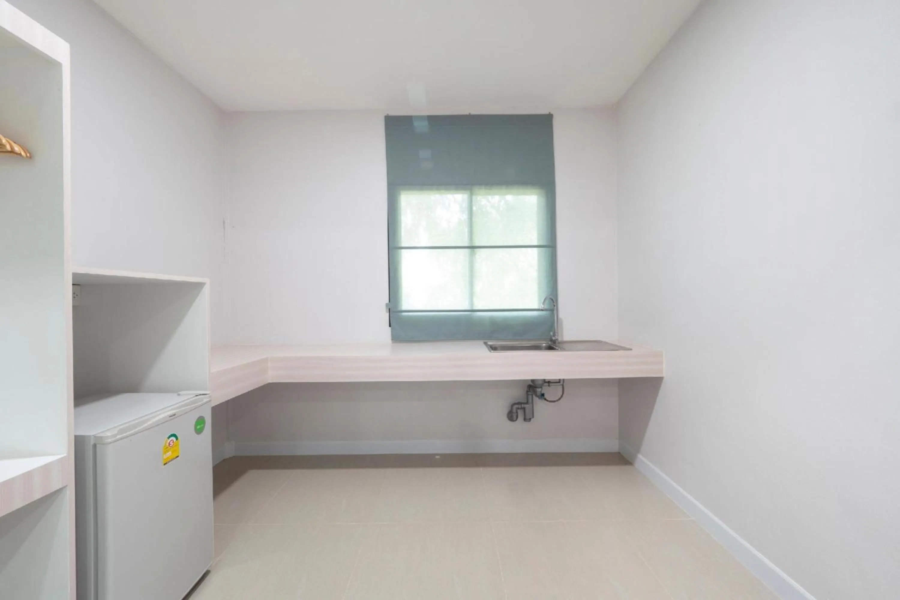 Bedroom in Capital O 75378 Thawapee Resort