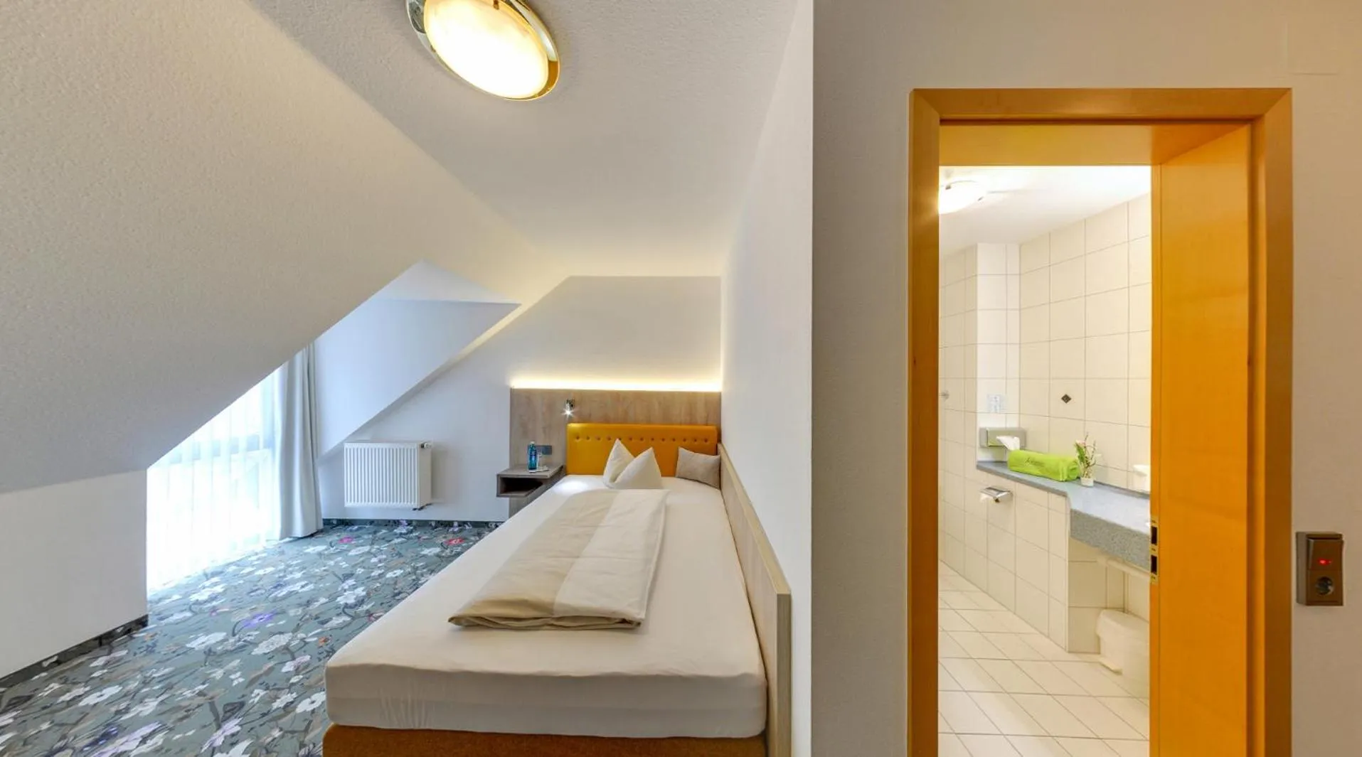 Photo of the whole room, Bed in Landhotel Seerose