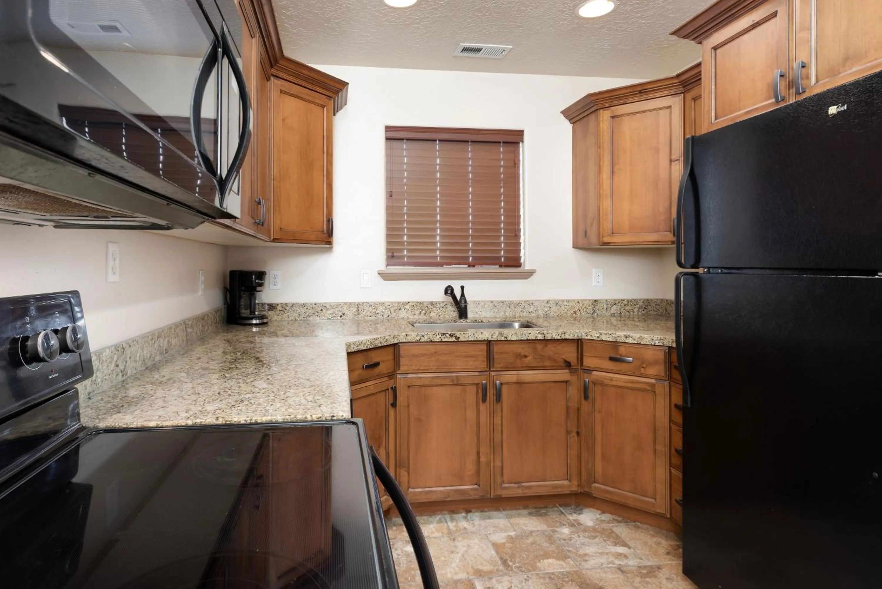 Kitchen or kitchenette in Duchesne Suites