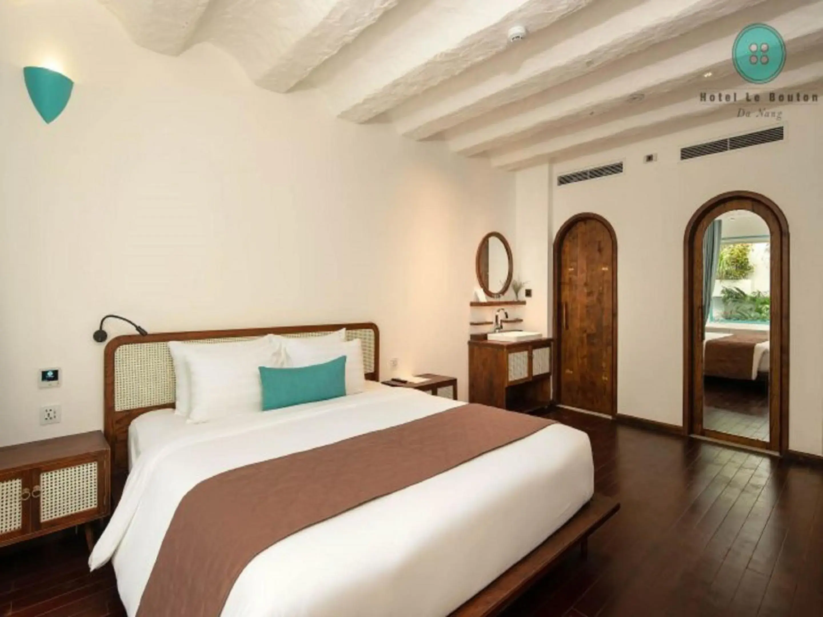 Bed in Hotel Le Bouton Bed in Hotel Le Bouton