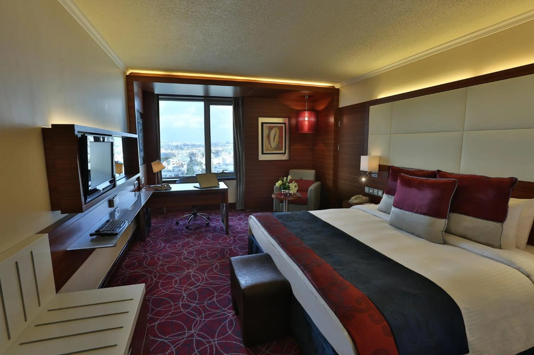 Photo of the whole room, Bed in Crowne Plaza Amman by IHG