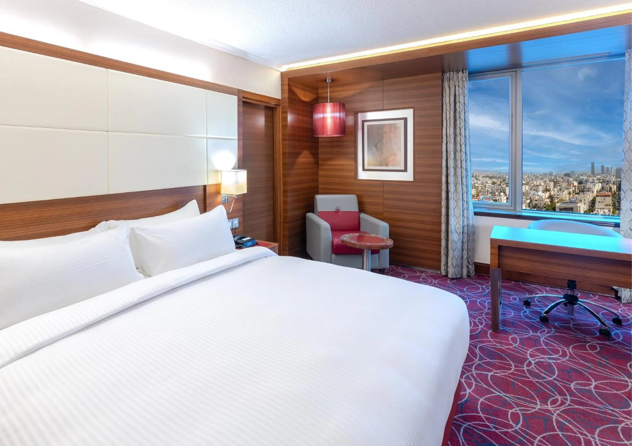 Photo of the whole room, Bed in Crowne Plaza Amman by IHG