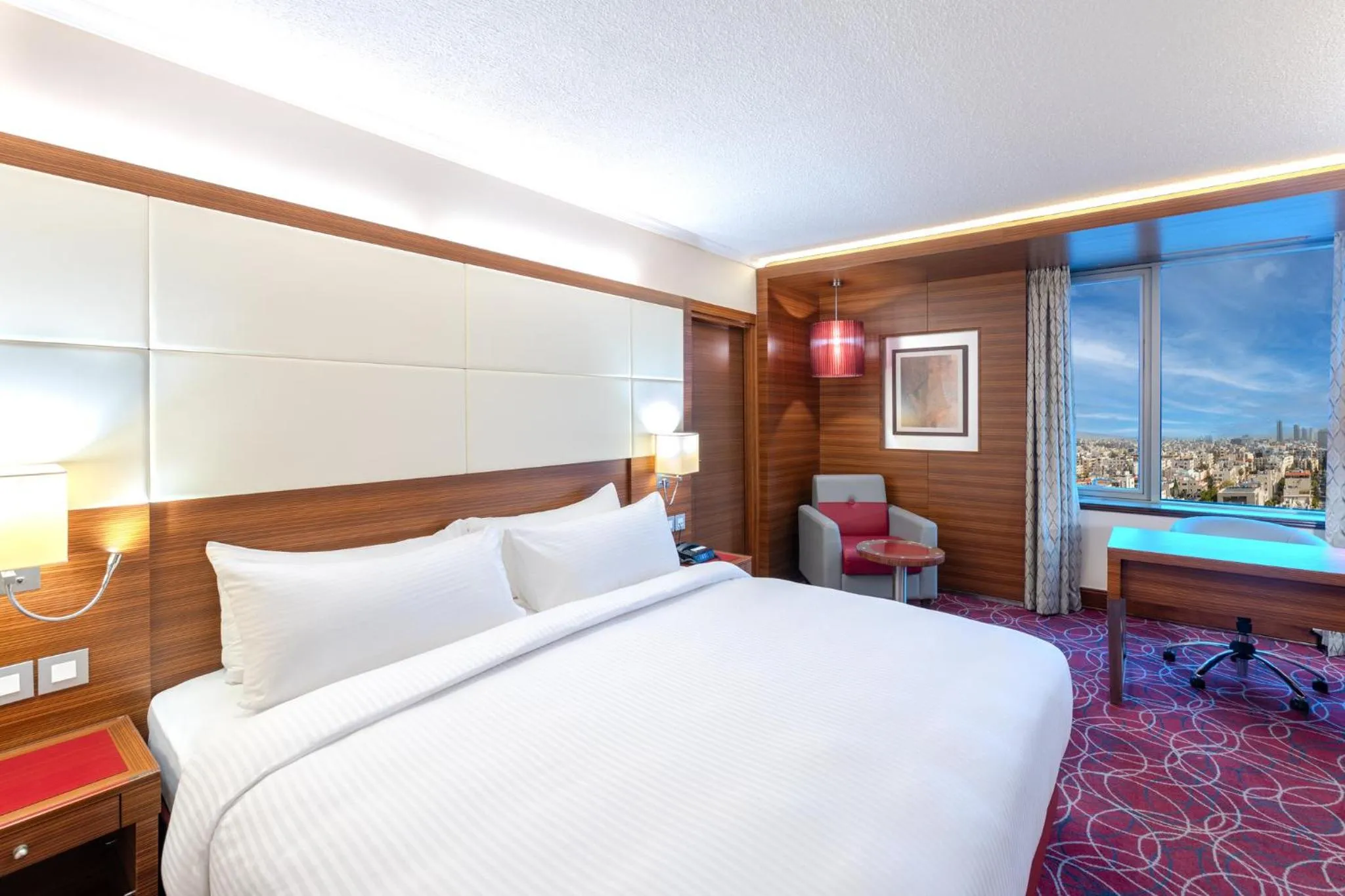 Photo of the whole room, Bed in Crowne Plaza Amman by IHG