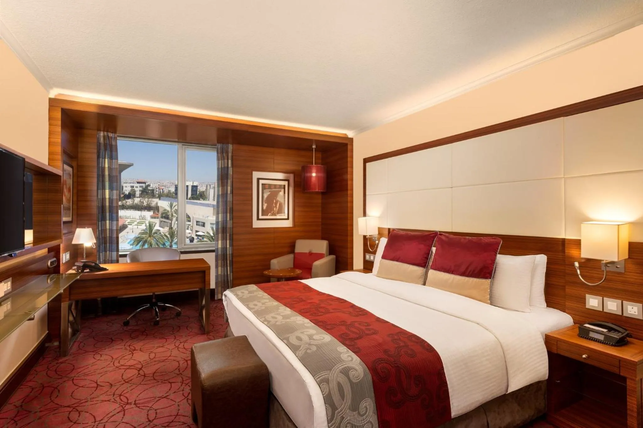Photo of the whole room, Bed in Crowne Plaza Amman by IHG