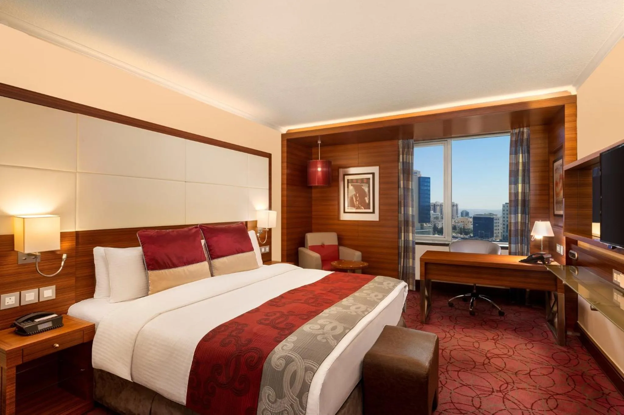 Photo of the whole room, Bed in Crowne Plaza Amman by IHG