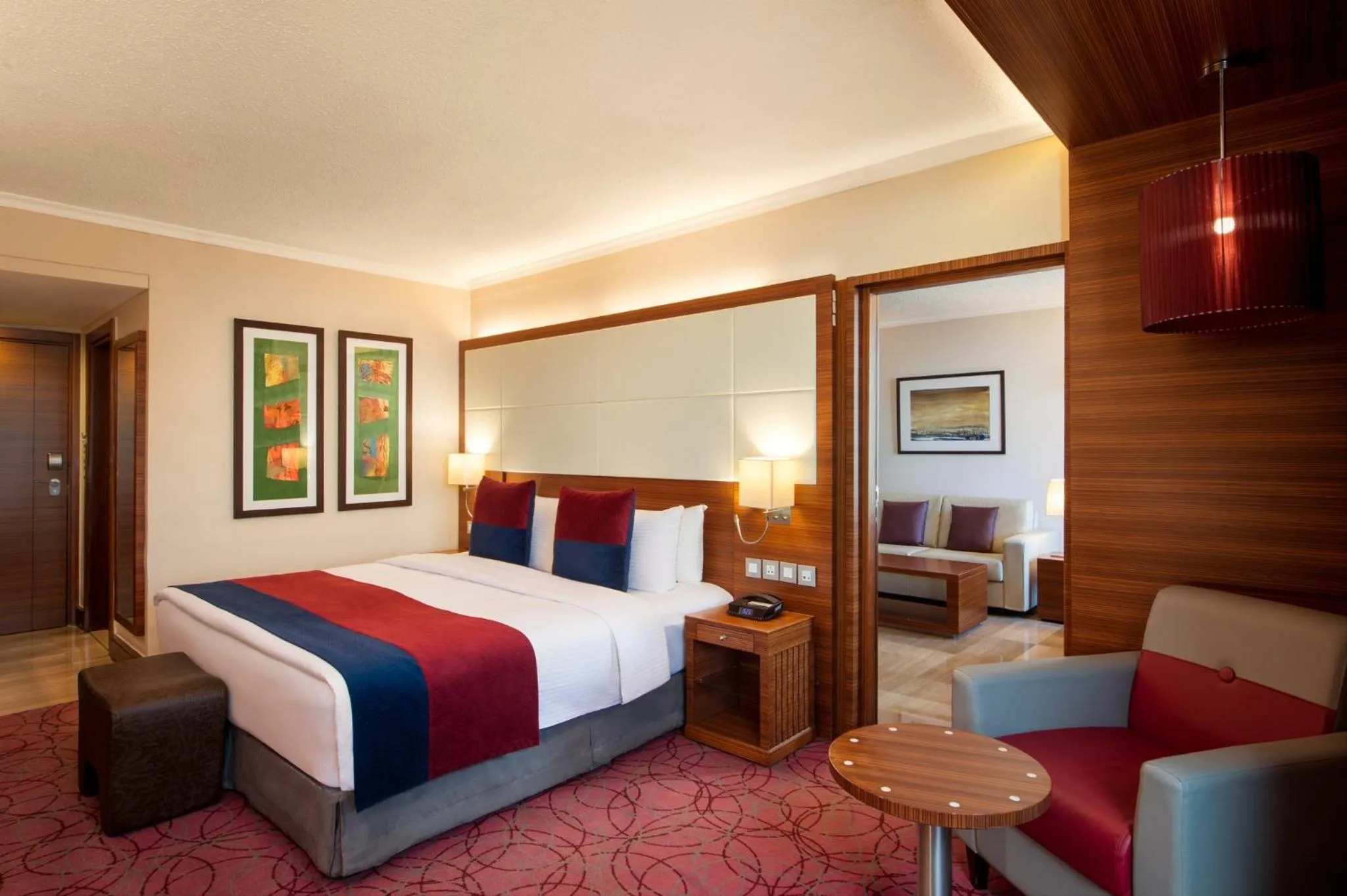 Photo of the whole room, Bed in Crowne Plaza Amman by IHG