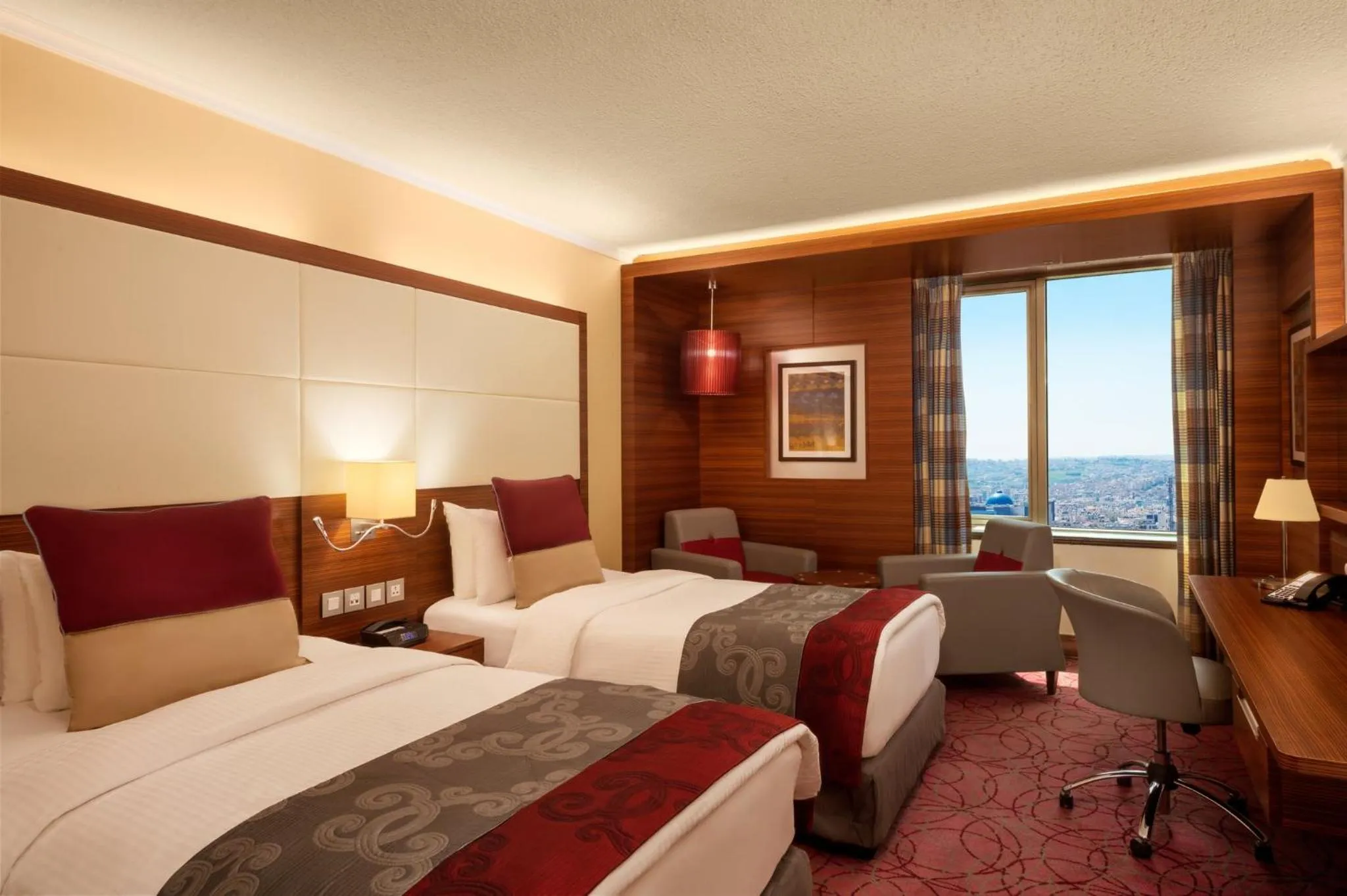 Photo of the whole room, Bed in Crowne Plaza Amman by IHG