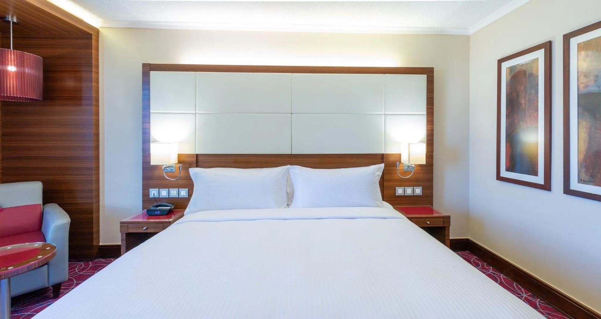 Photo of the whole room, Bed in Crowne Plaza Amman by IHG