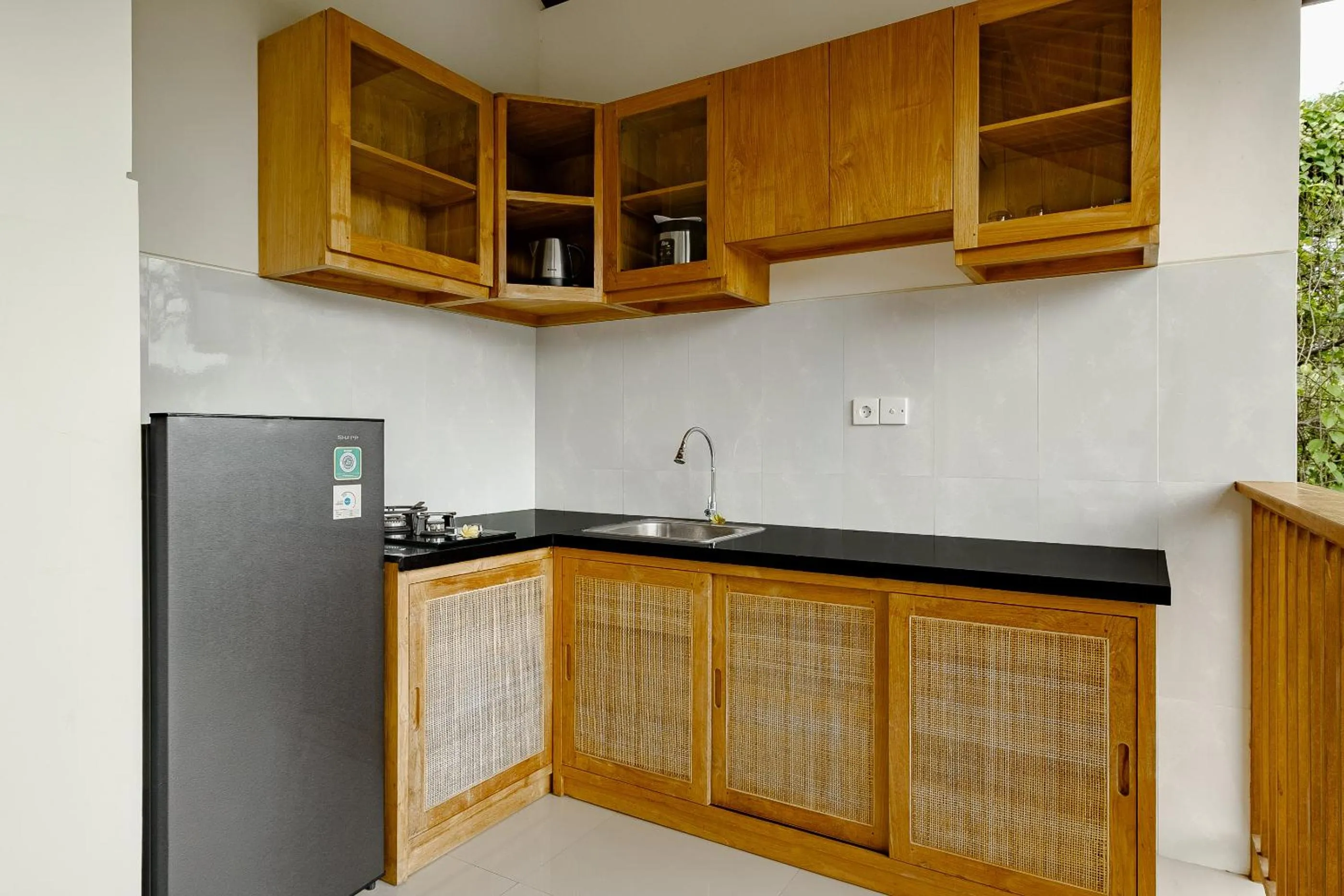Kitchen or kitchenette in Yanyan Resort Ubud