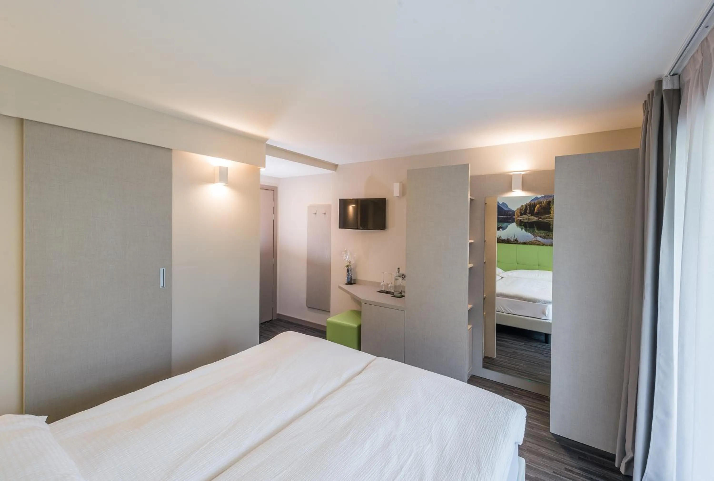 Photo of the whole room, Bed in Adhhoc Hotel