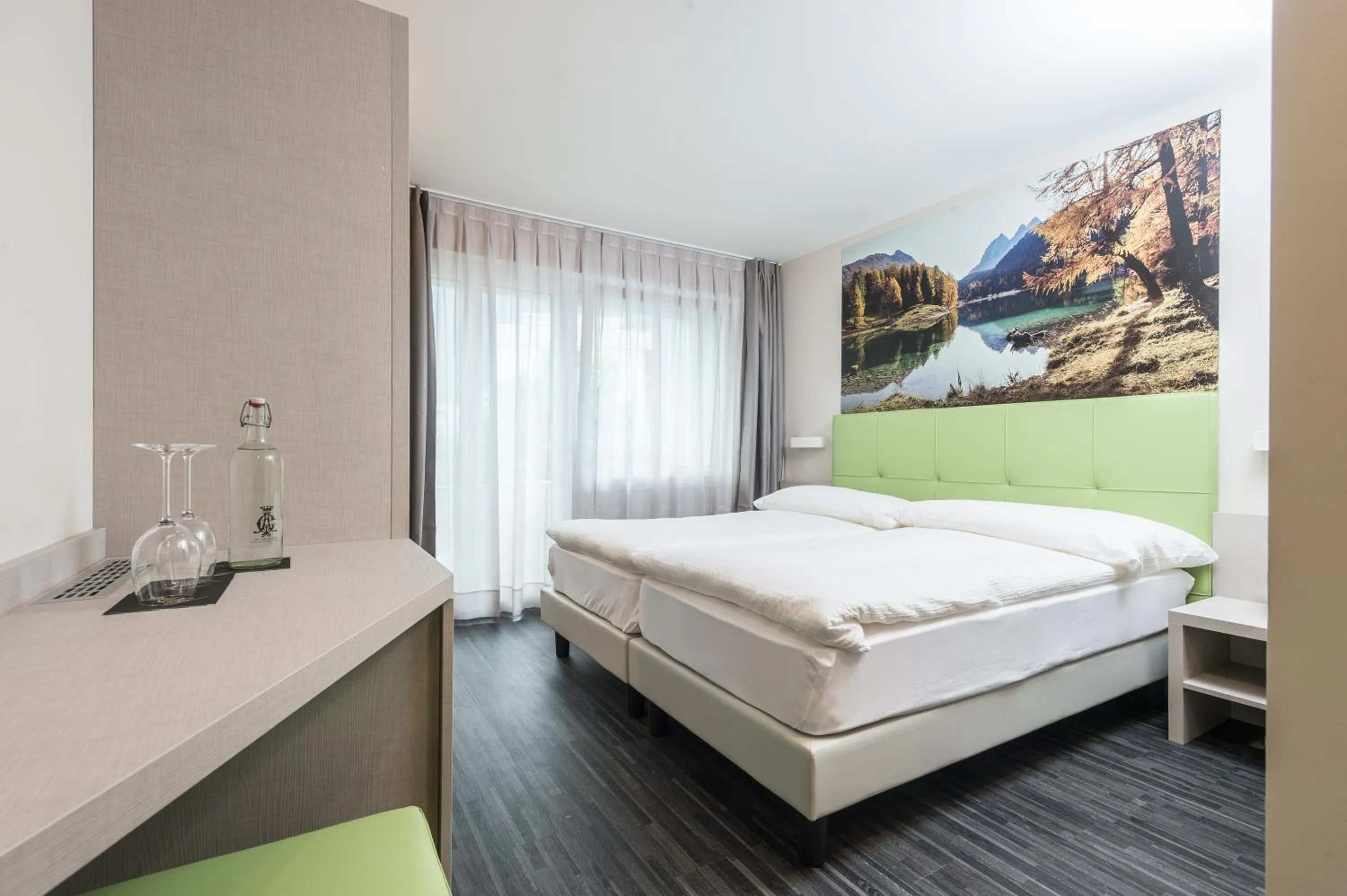 Photo of the whole room, Bed in Adhhoc Hotel