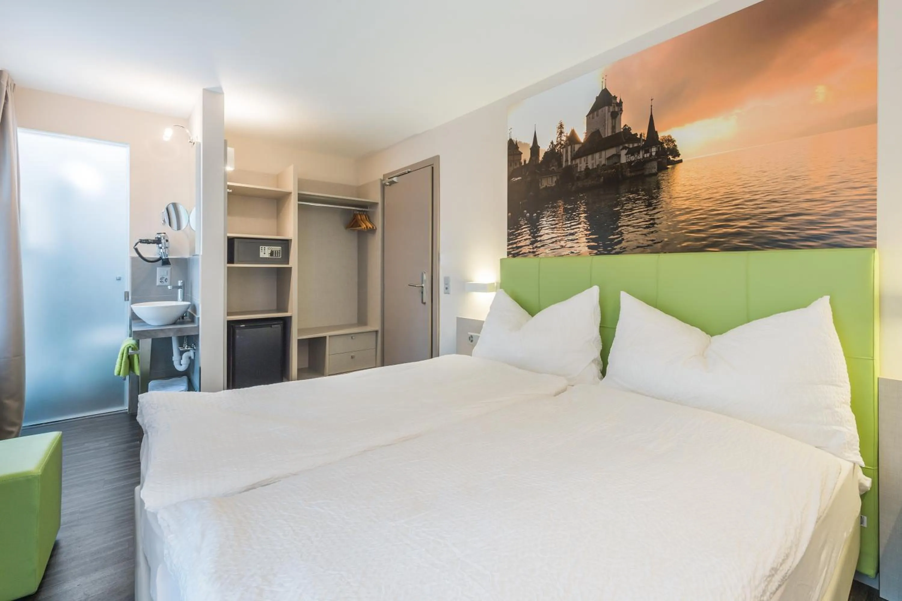 Photo of the whole room, Bed in Adhhoc Hotel