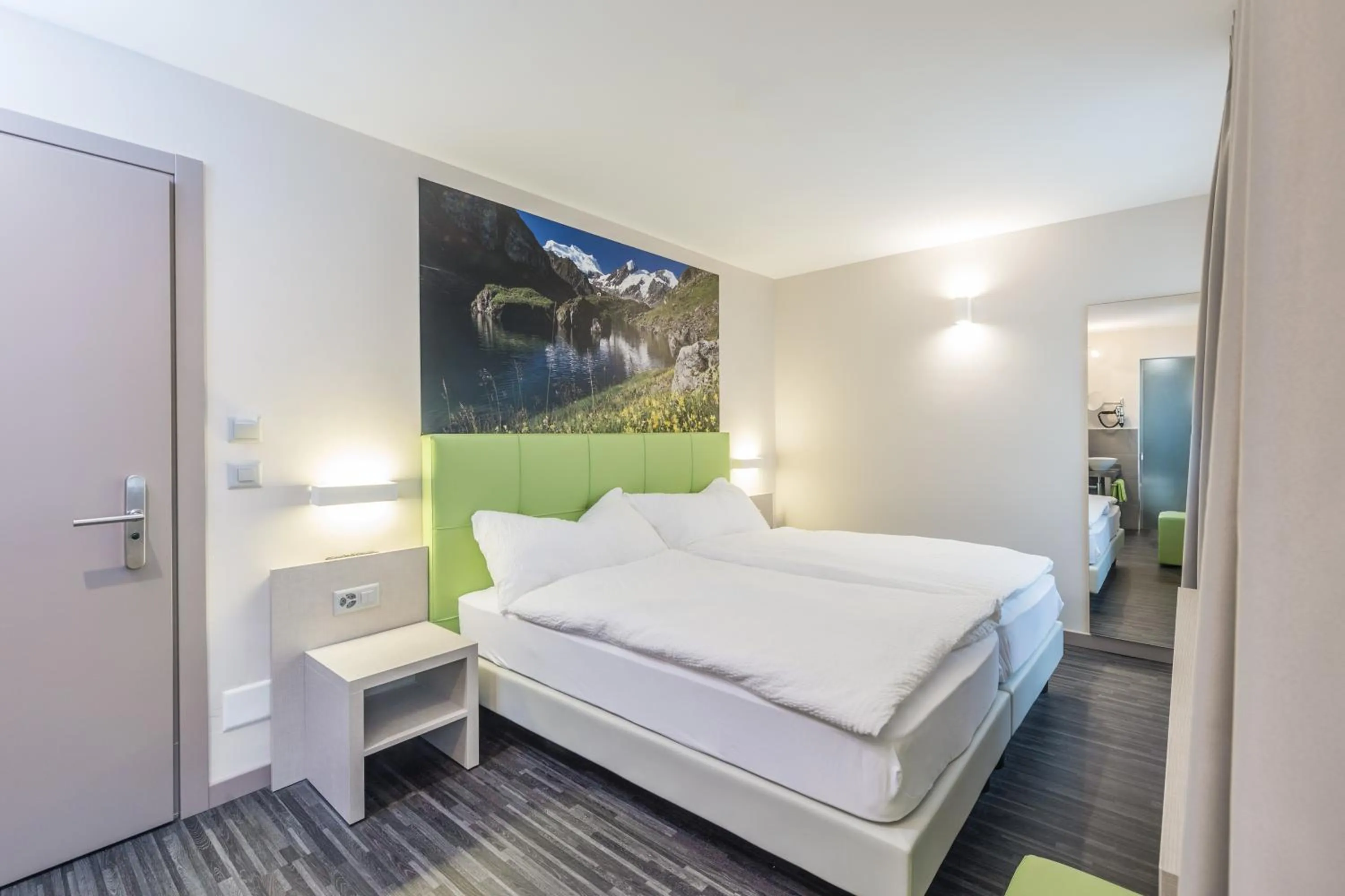 Photo of the whole room, Bed in Adhhoc Hotel