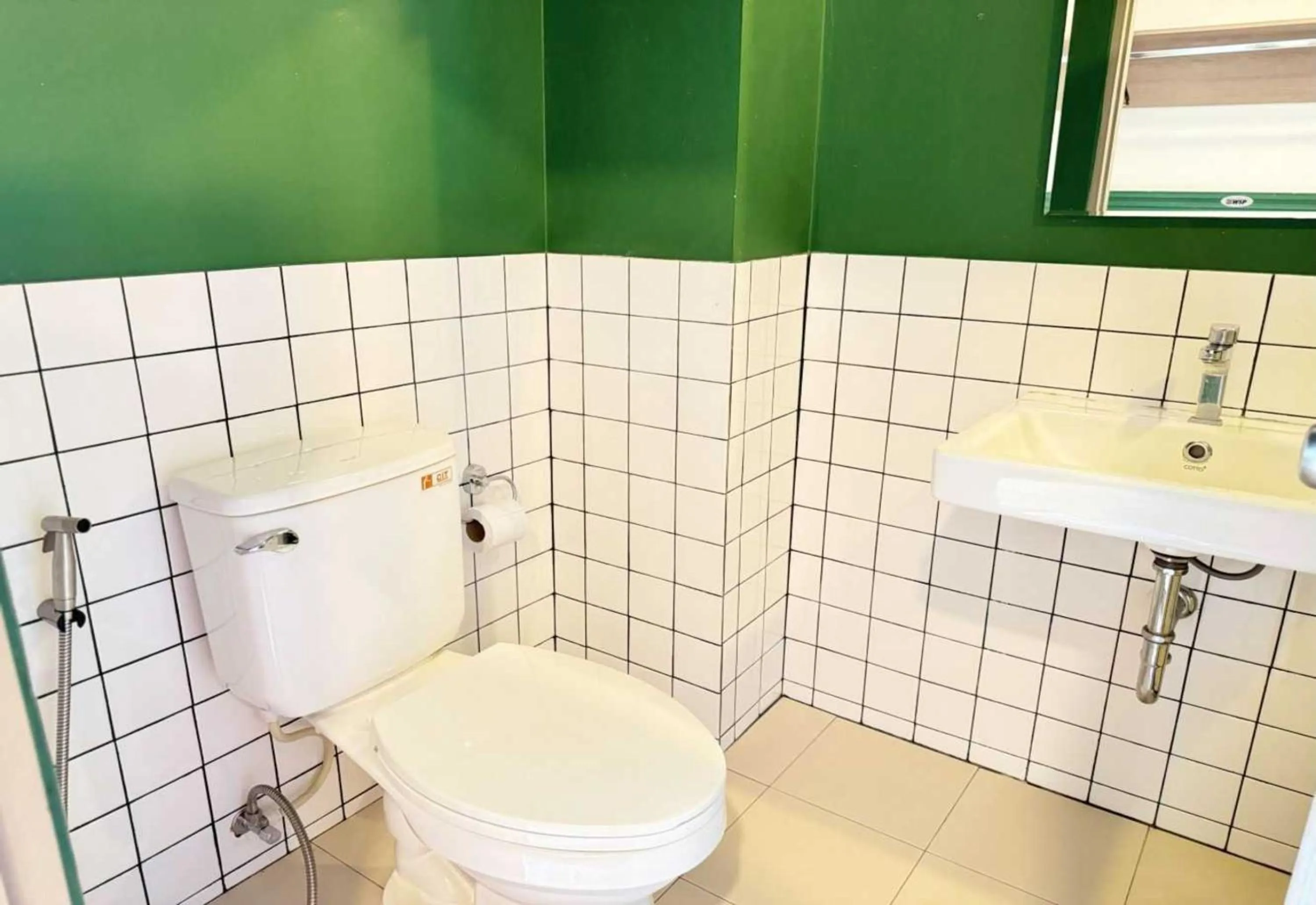 Bathroom in Collection O The Singha Chiangmai Hotel