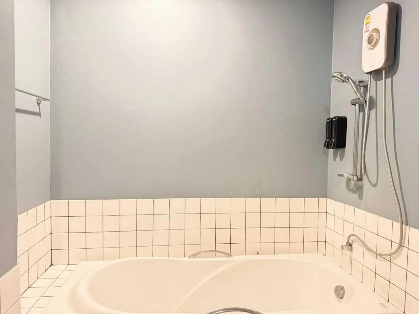 Bathroom in Collection O The Singha Chiangmai Hotel