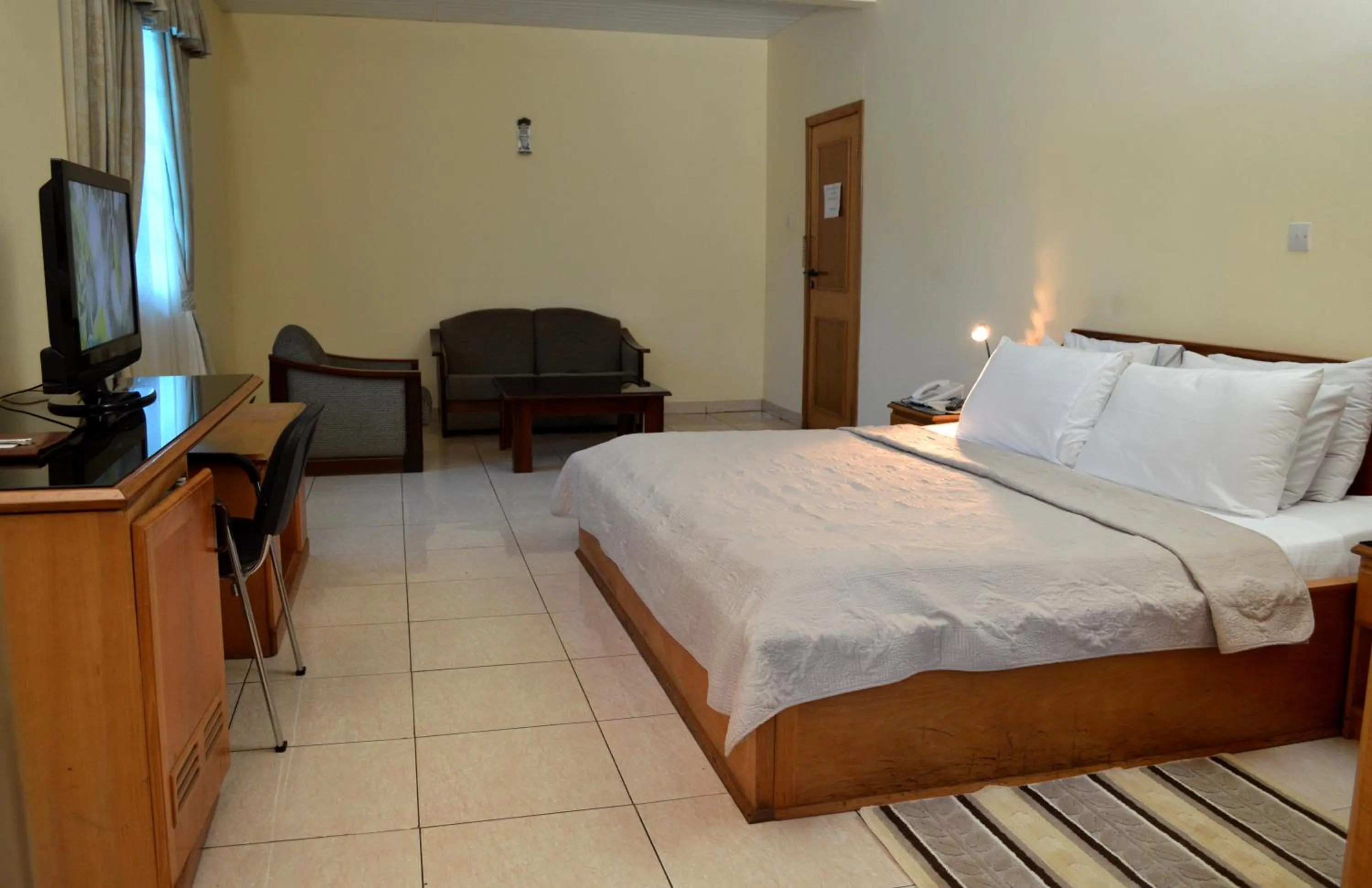 Photo of the whole room, Bed in Monarch Hotel