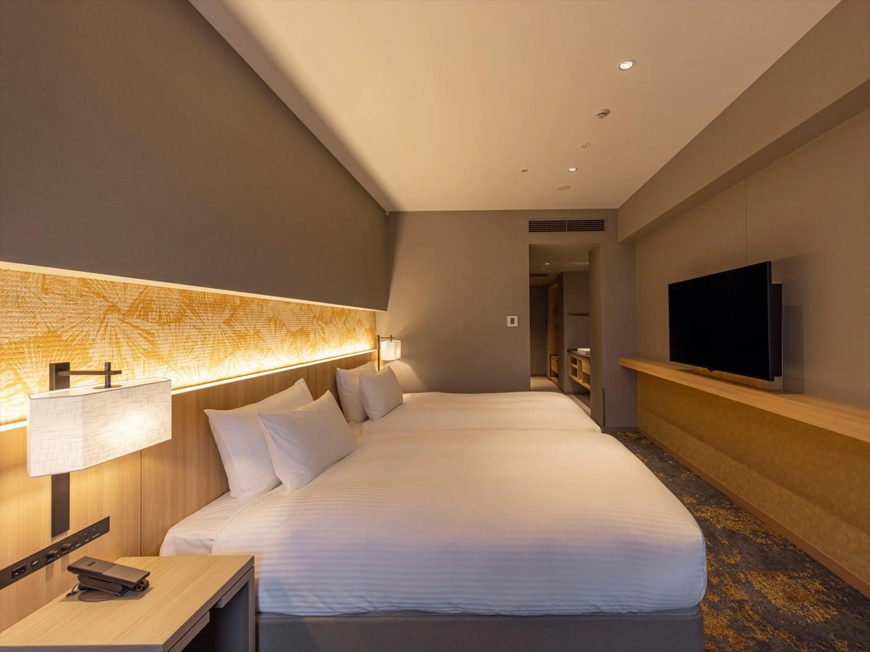 Bed in THE BLOSSOM KUMAMOTO