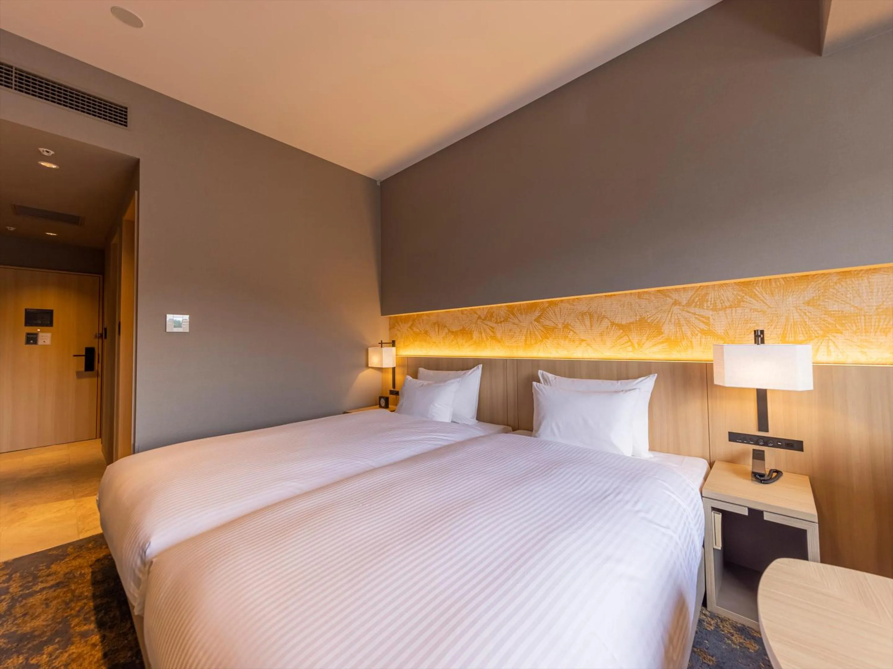 Bed in THE BLOSSOM KUMAMOTO