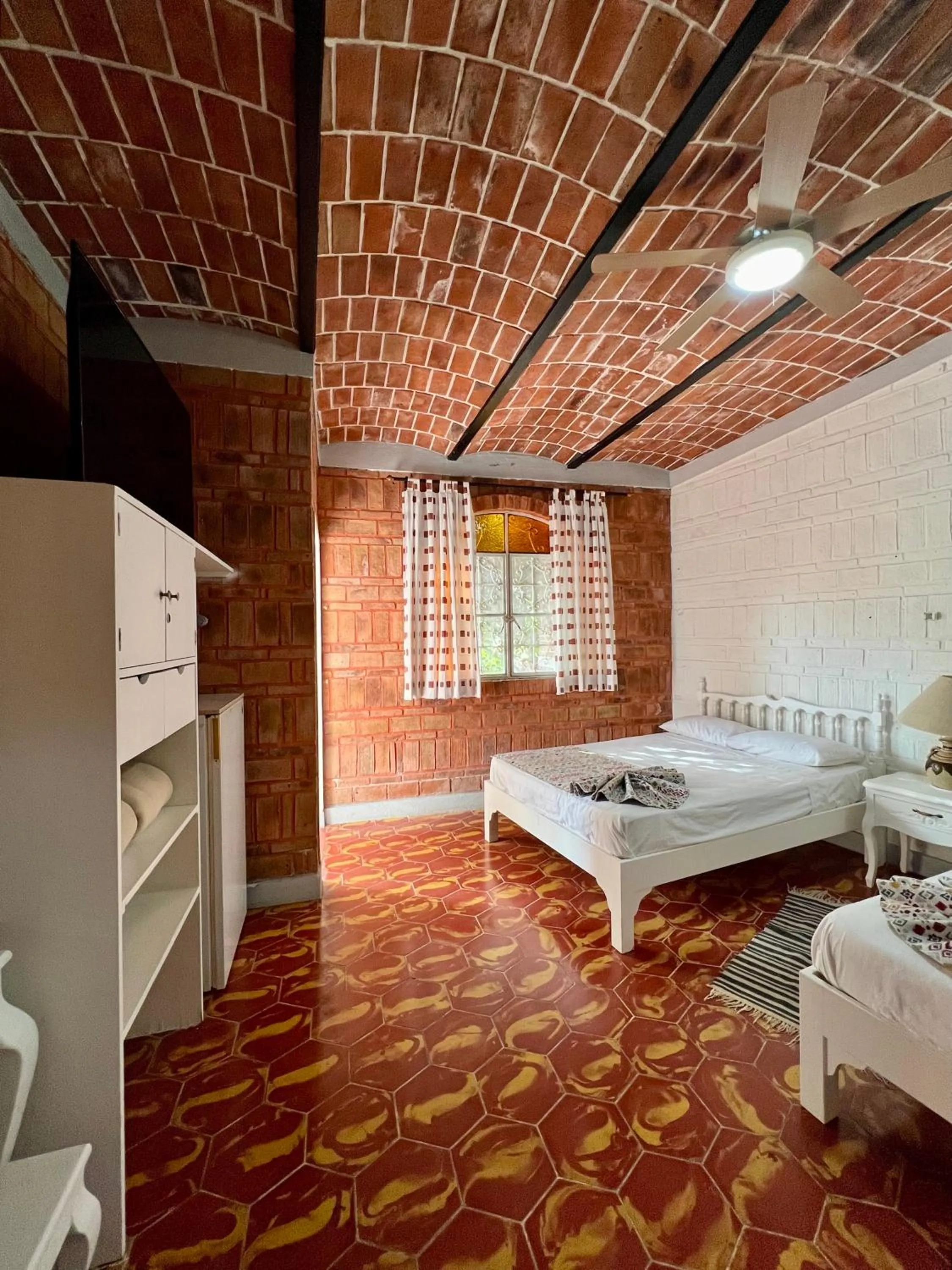 Photo of the whole room, Bed in Mama Chuy Hotel & Villas Ajijic