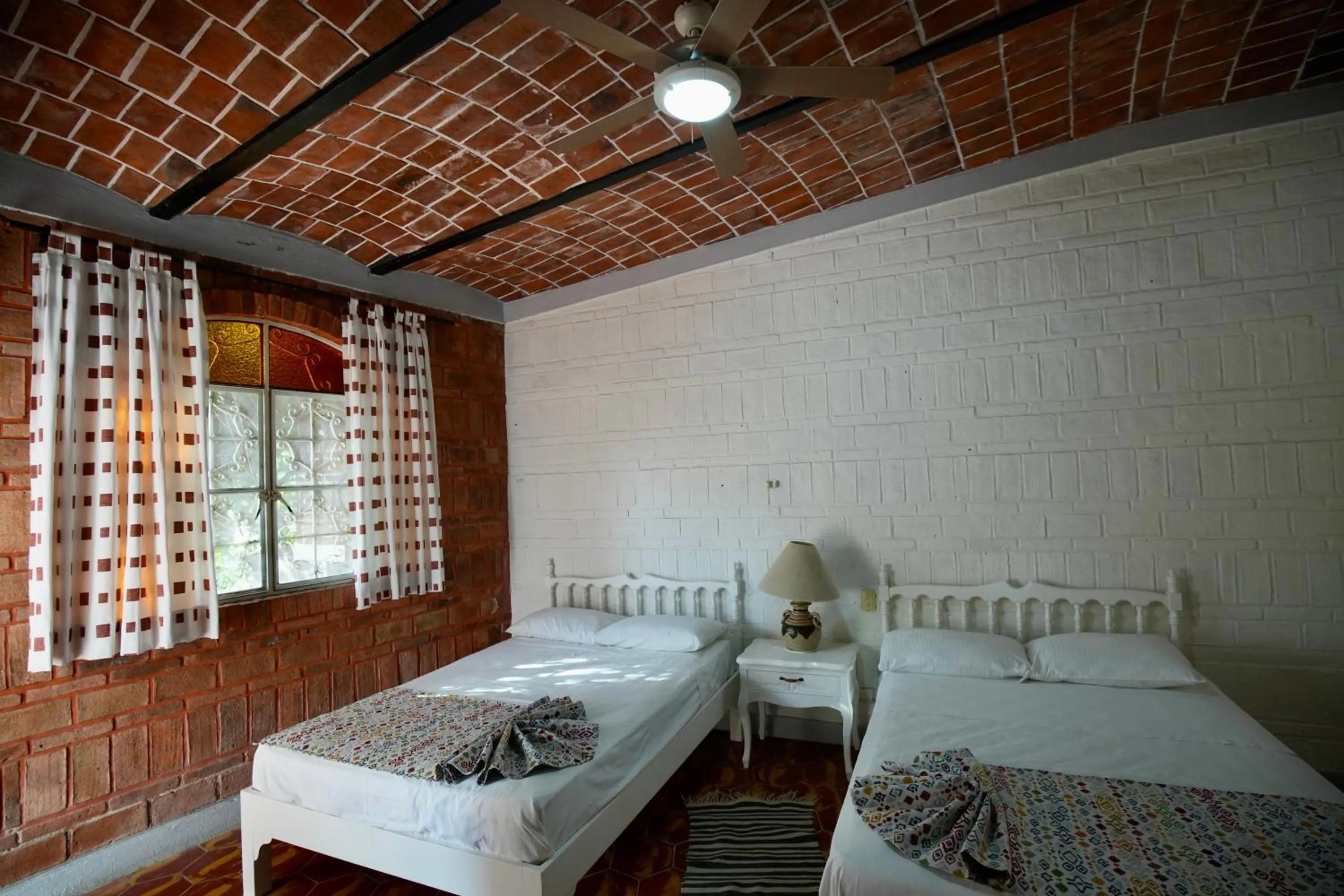 Bed in Mama Chuy Hotel & Villas Ajijic